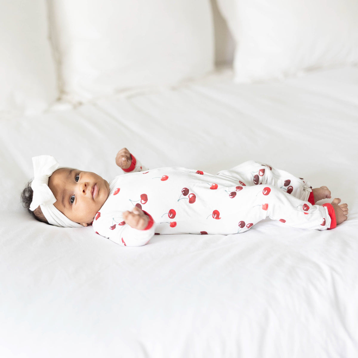 Kyte Baby Zippered Rompers Zippered Romper in Cherry
