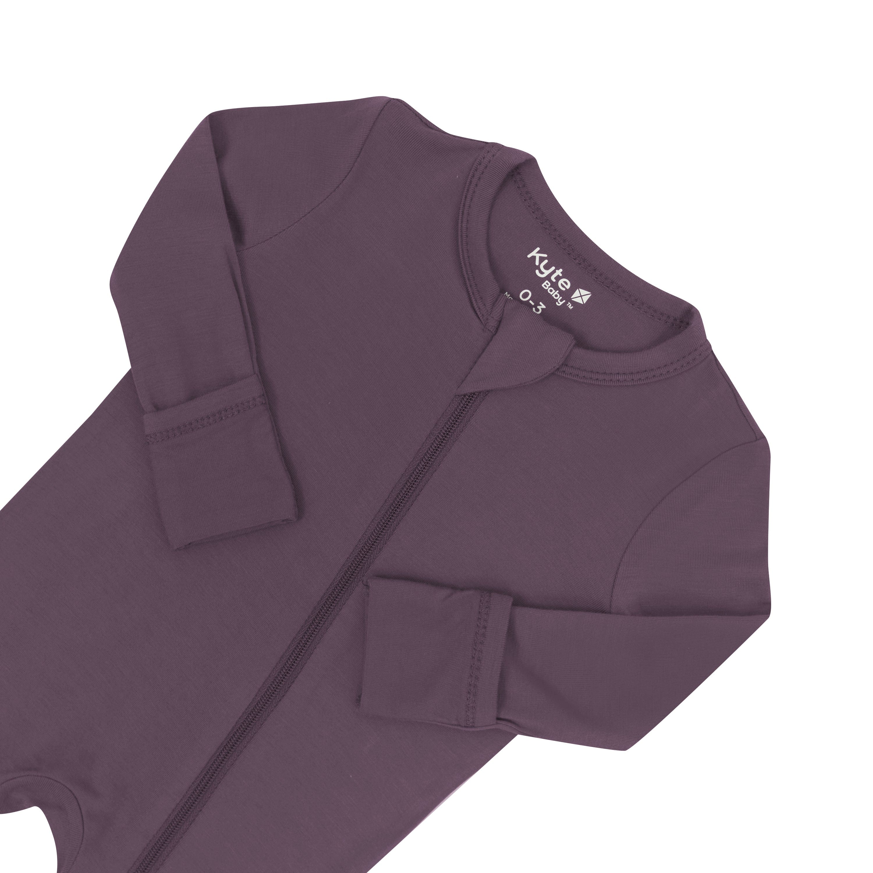 Zipper garage and fold over hand cuffs shown on the Zippered Romper in Currant