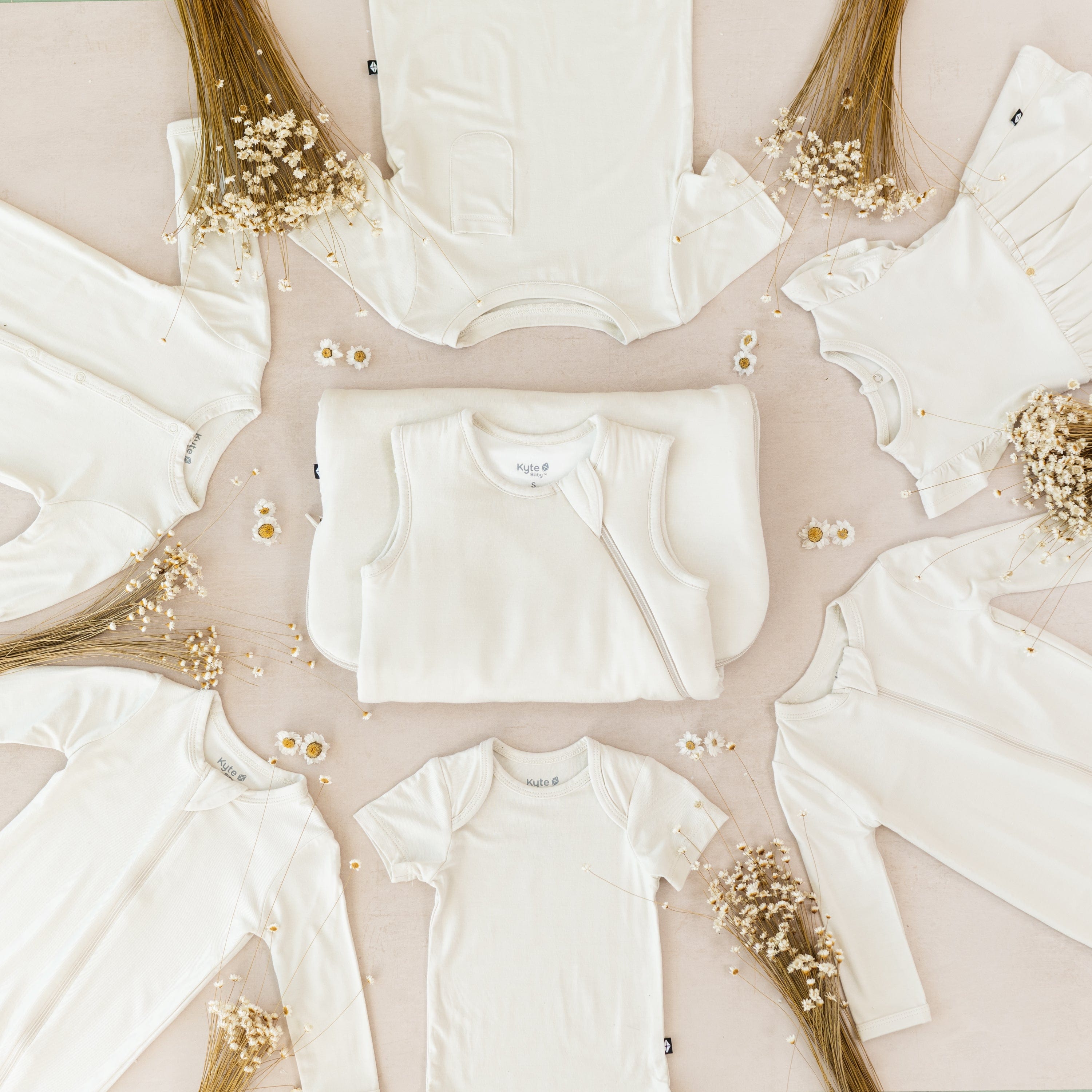 Kyte Baby bamboo baby clothing and sleep bags in Ecru