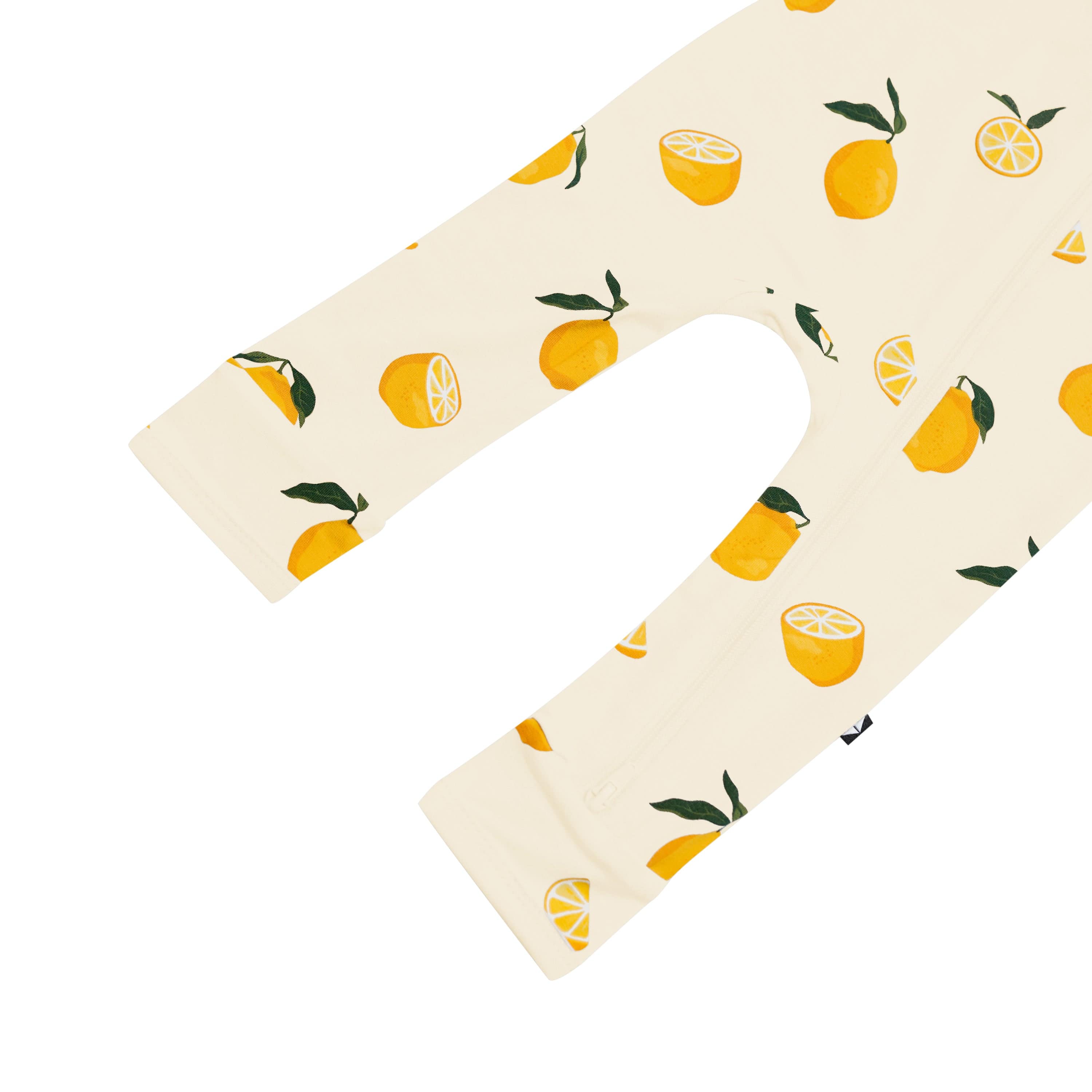 Dual zipper on Kyte Baby Zippered Romper in Lemon