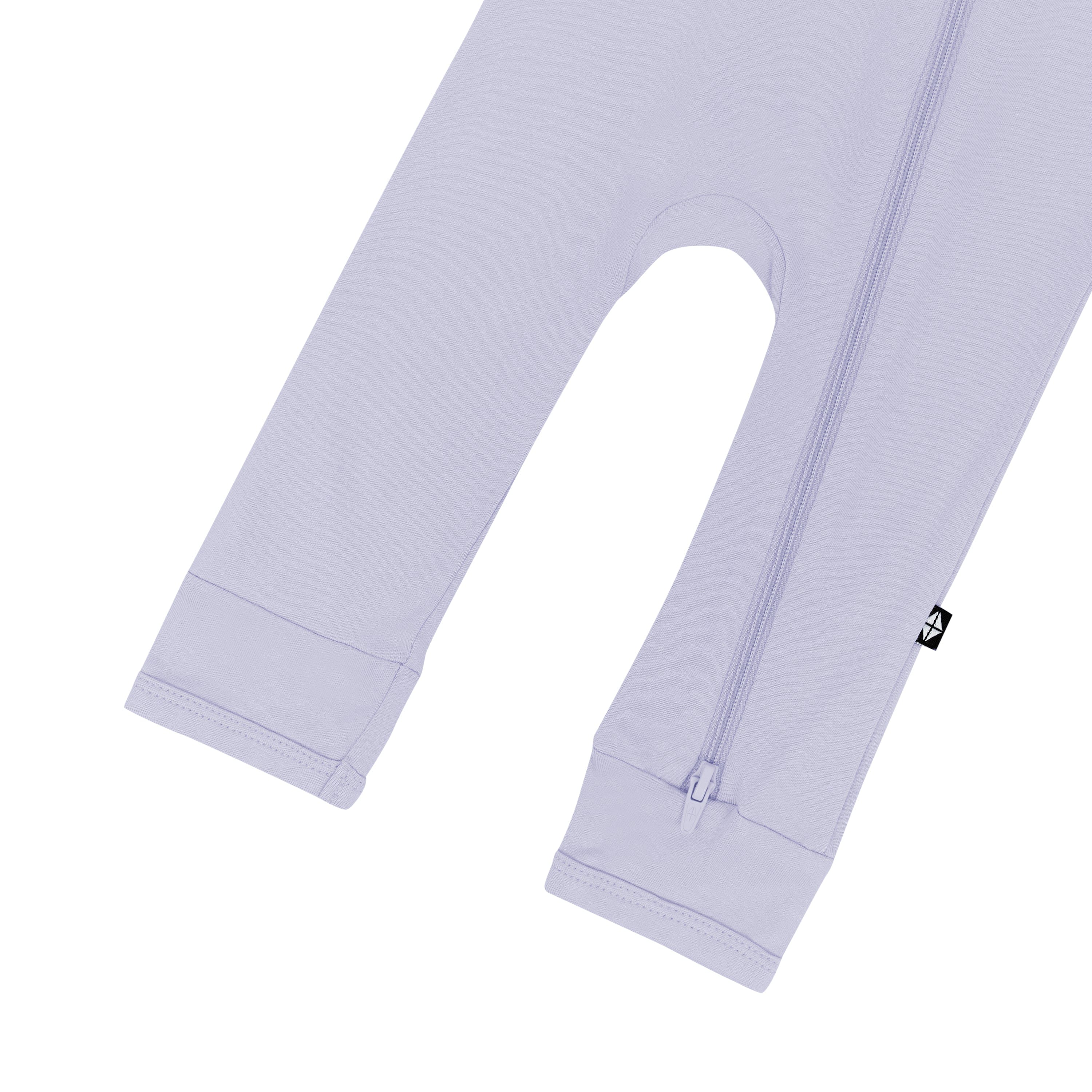 Open feet on Kyte Baby Zippered Romper in Lilac
