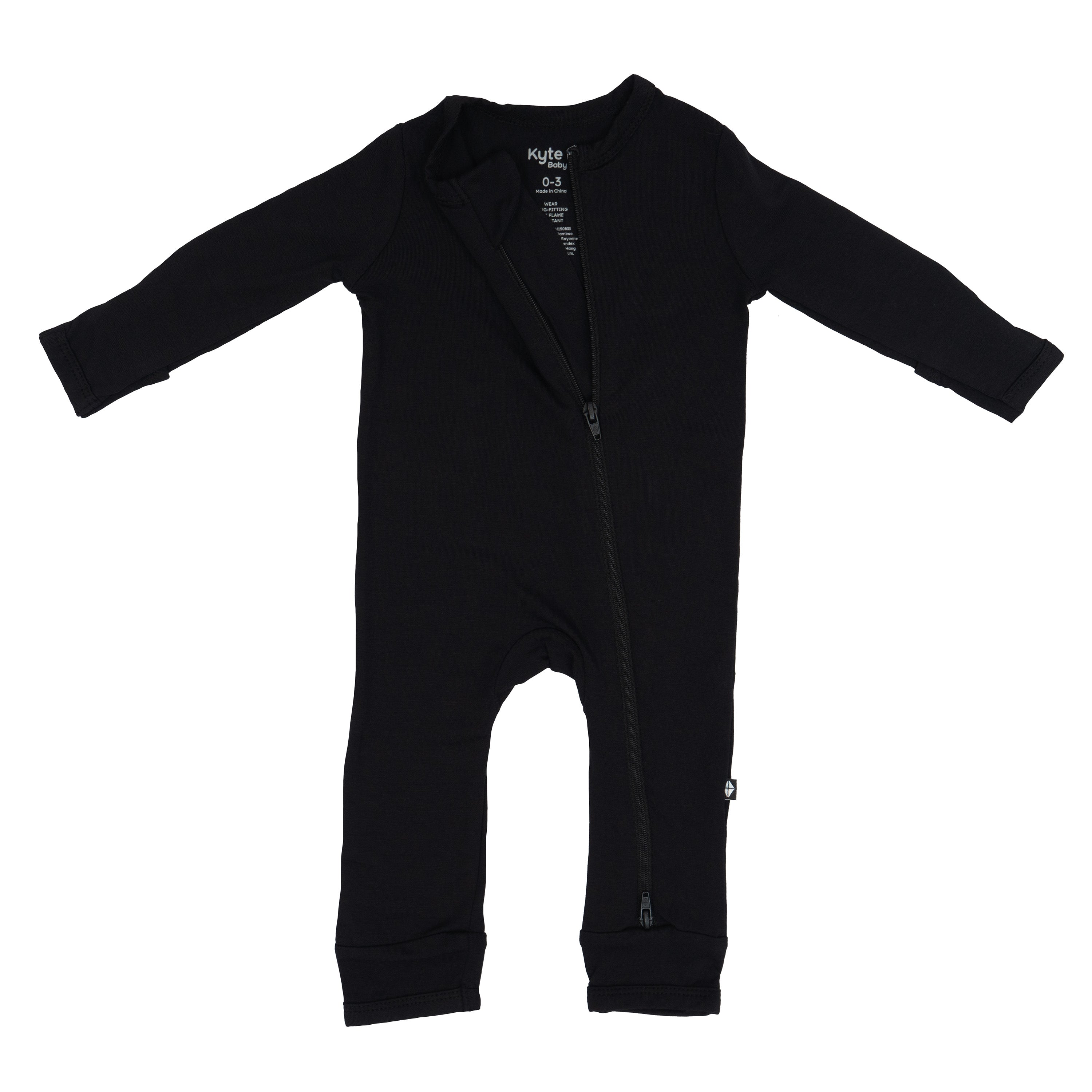 Zippered Romper in Midnight with dual zipper partially unzipped from the top