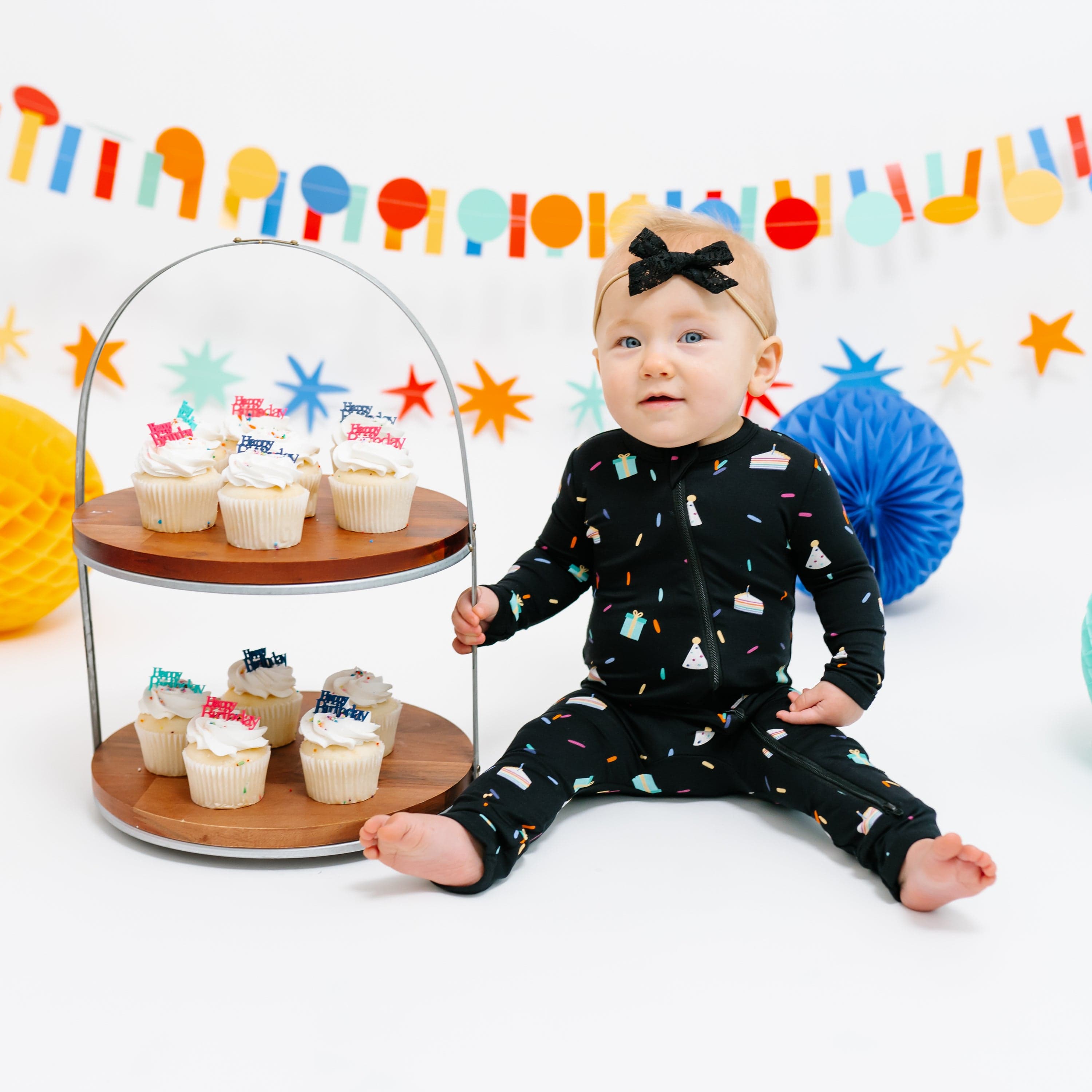 Kyte Baby Zippered Rompers Zippered Romper in Midnight Party