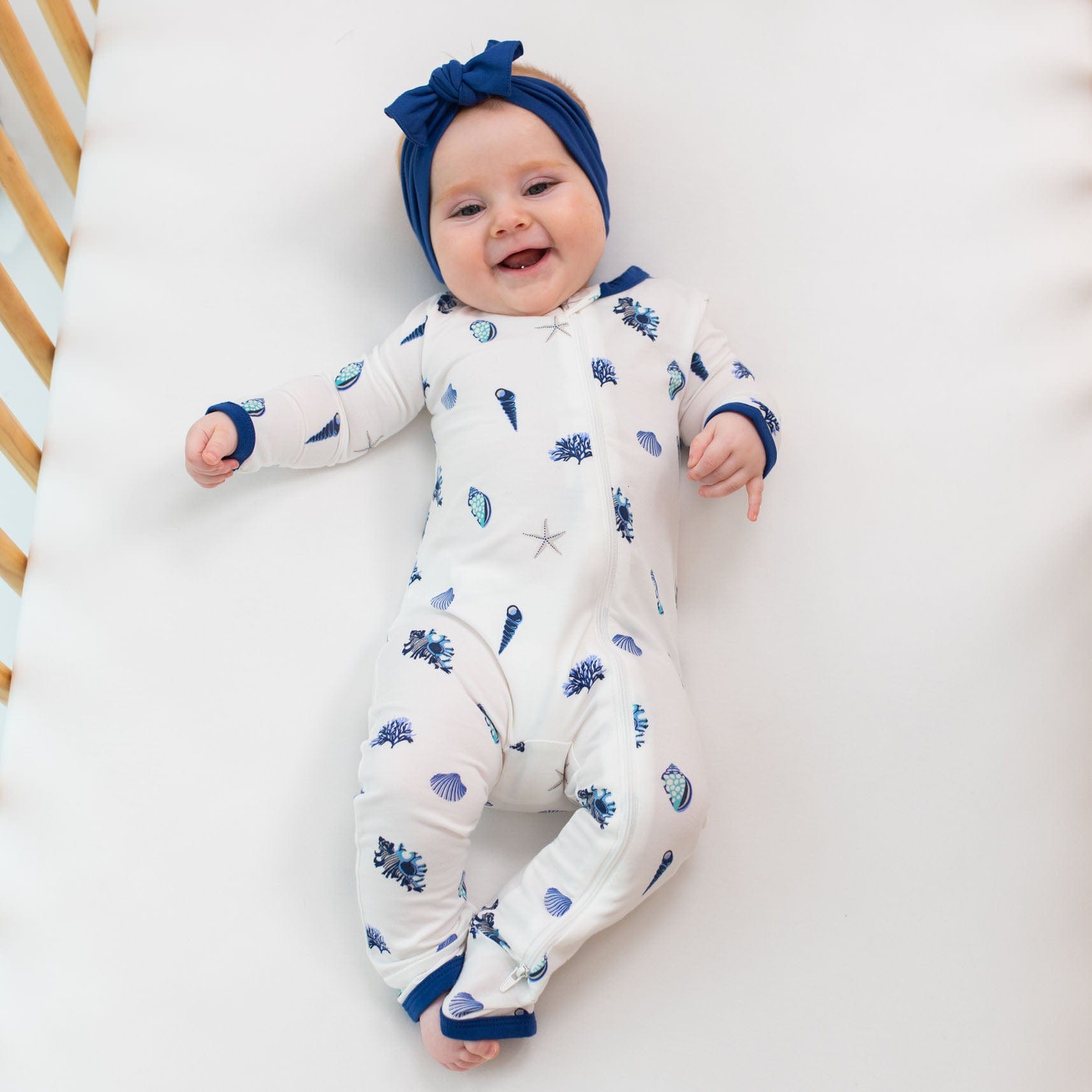 Kyte Baby Zippered Rompers Zippered Romper in Royal Shell
