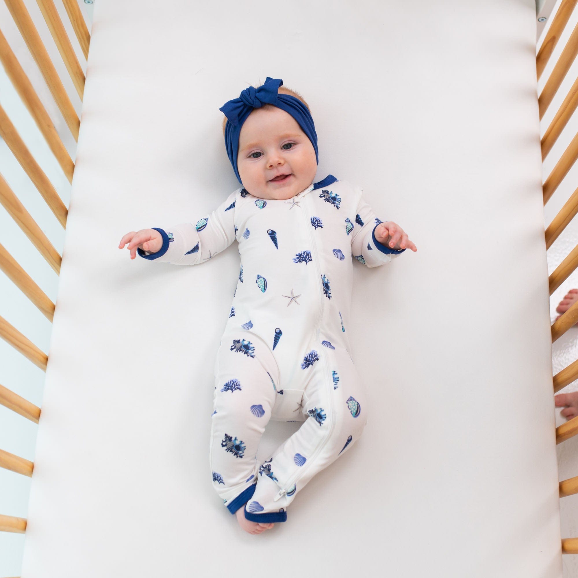 Kyte Baby Zippered Rompers Zippered Romper in Royal Shell