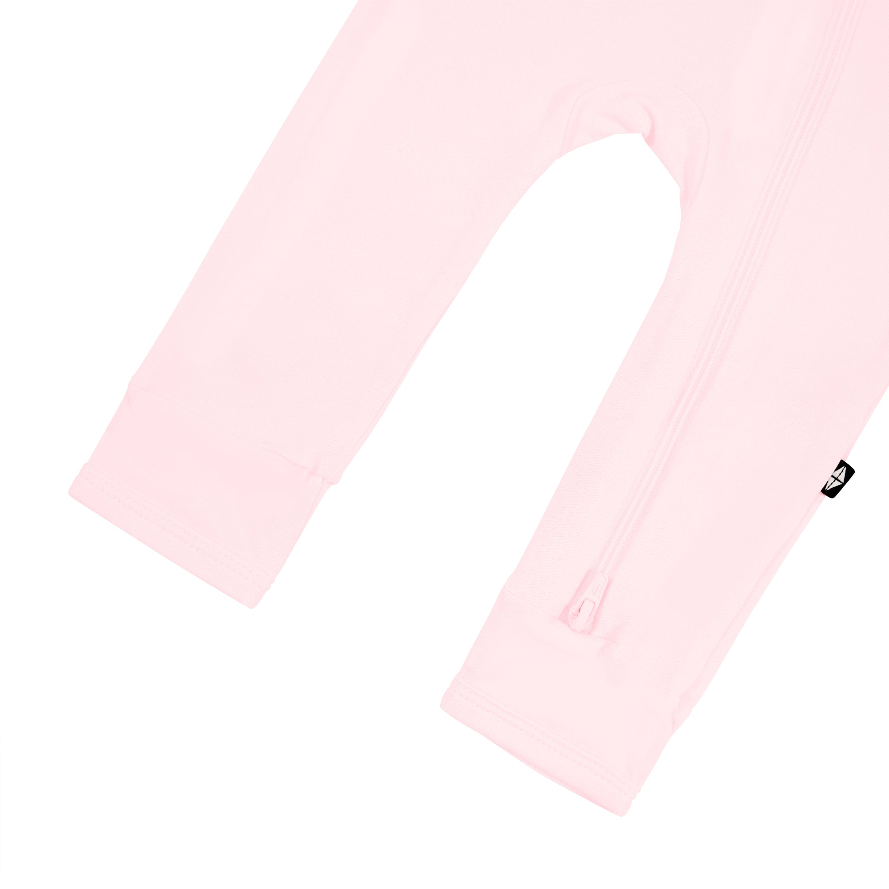Open feet on Kyte Baby Zippered Romper in Sakura