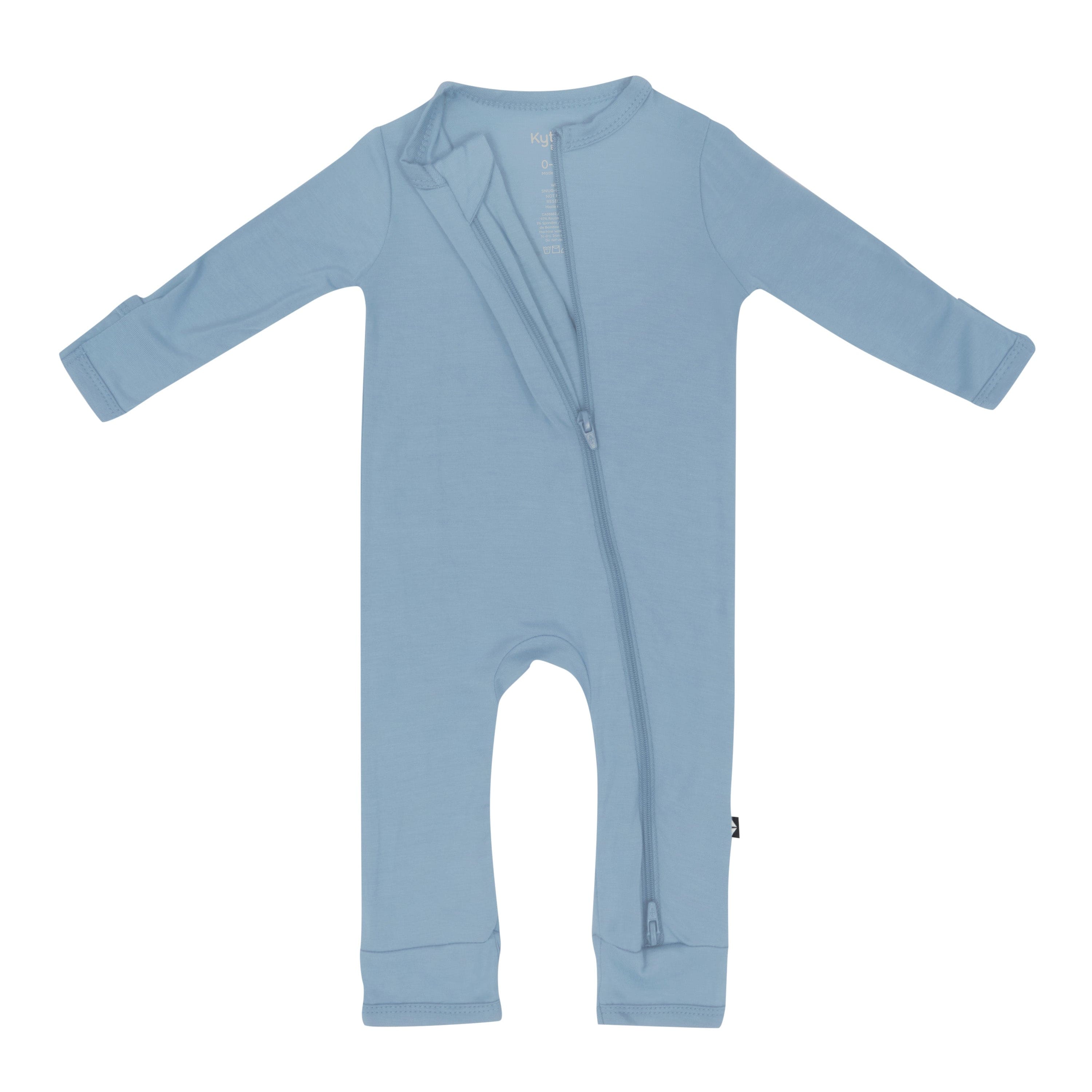 Dual zipper partially unzipped from the top on the Zippered Romper in Slate