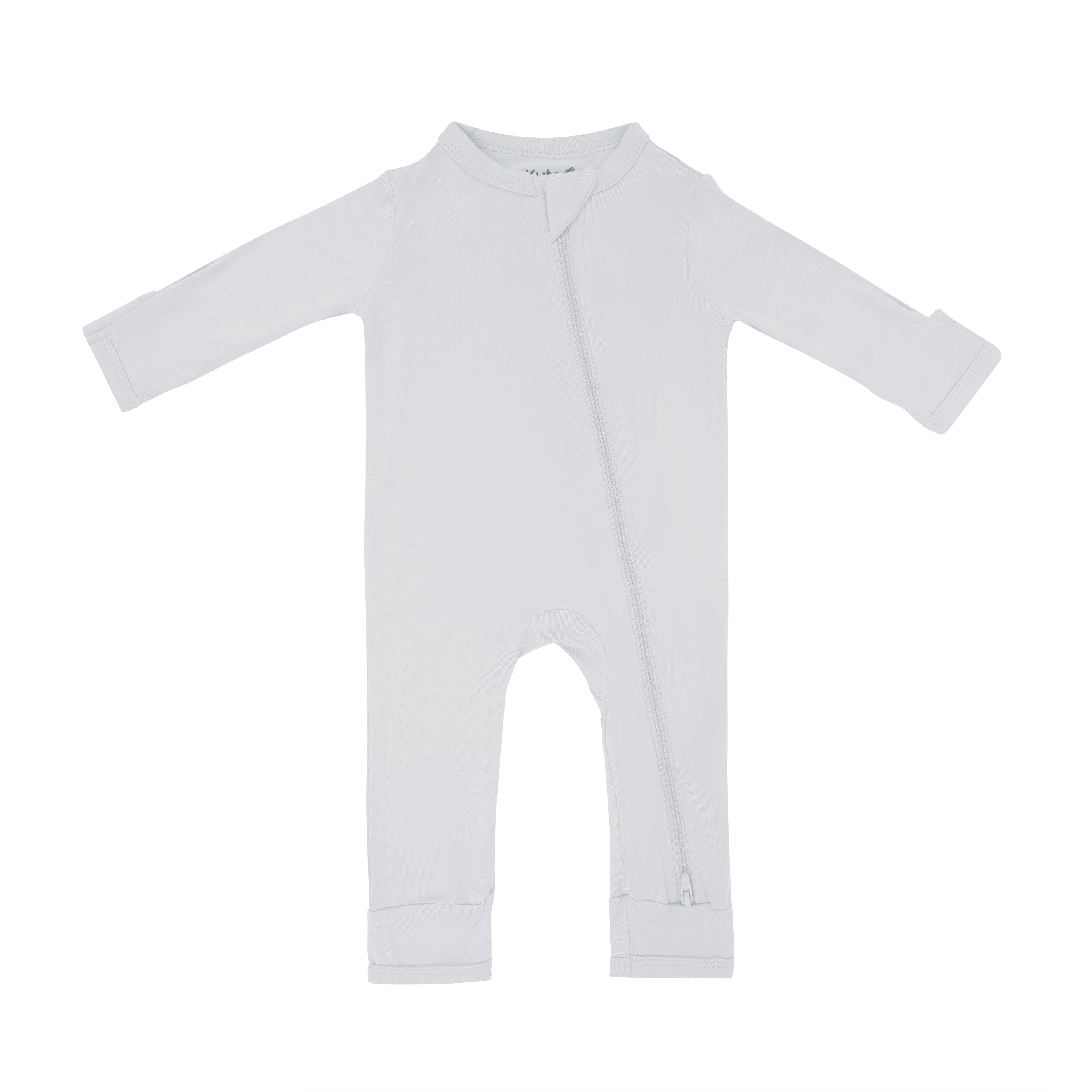 Flat lay of Kyte Baby Zippered Romper in Storm