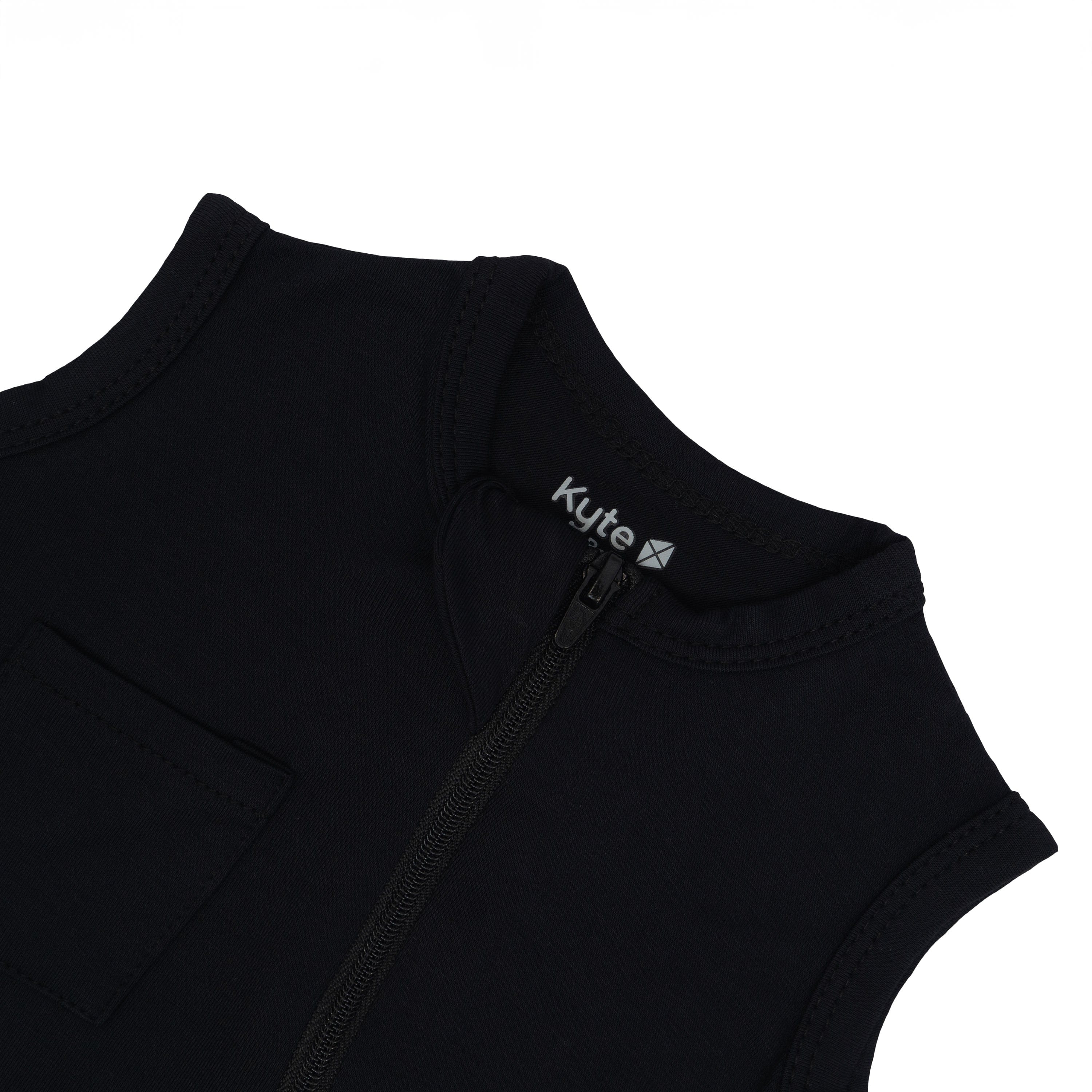 Close up of zipper garage on Kyte Baby Zippered Sleeveless Romper in Midnight