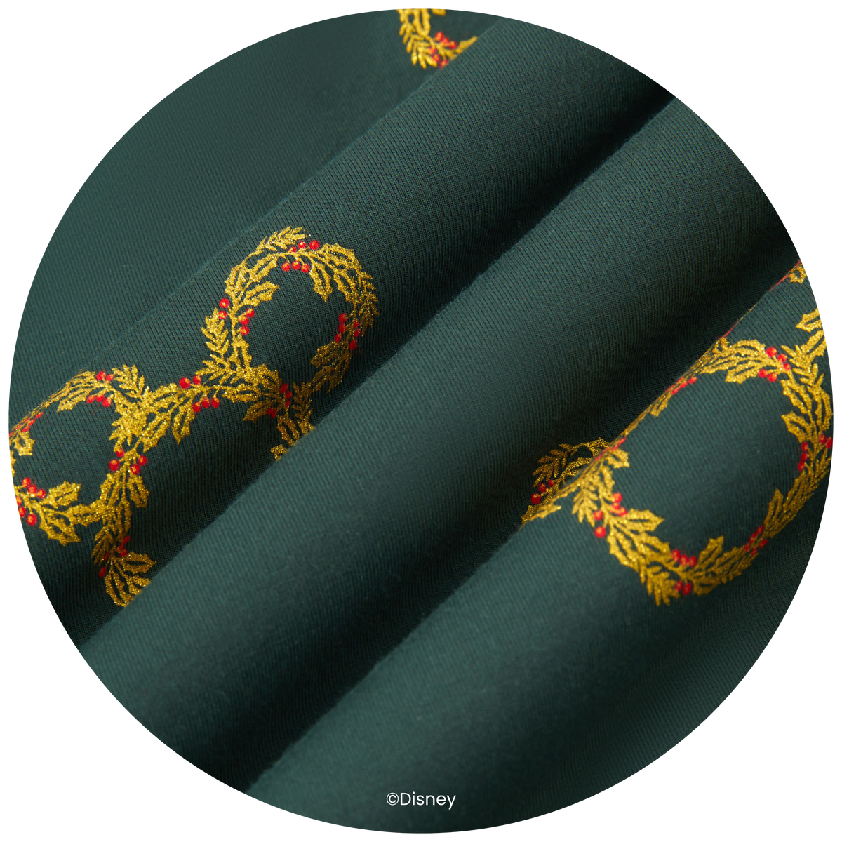 green fabric with gold mickey ear wreath pattern