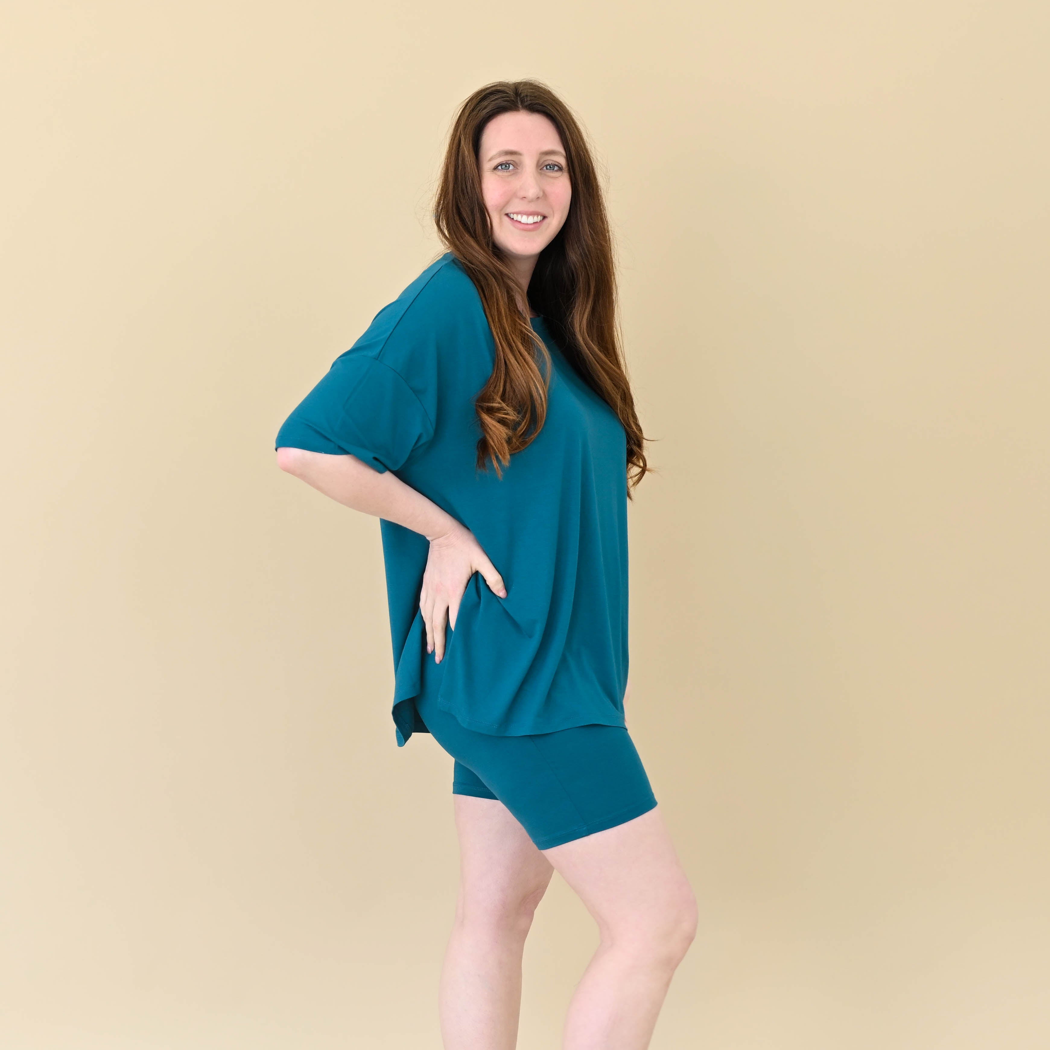 Woman modeling Women’s Biker Short Set in Loch showing side of shorts