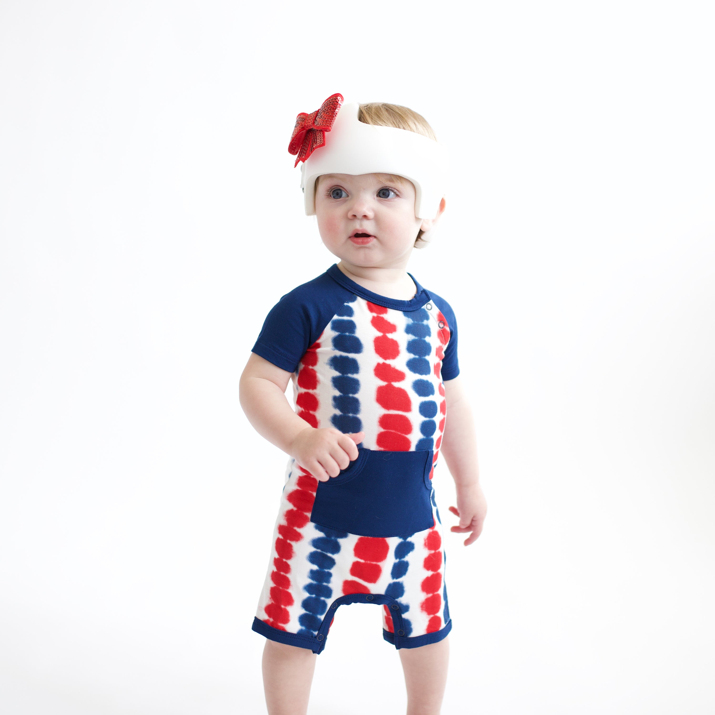 Baby wearing Shortall in Liberty Rip Tide