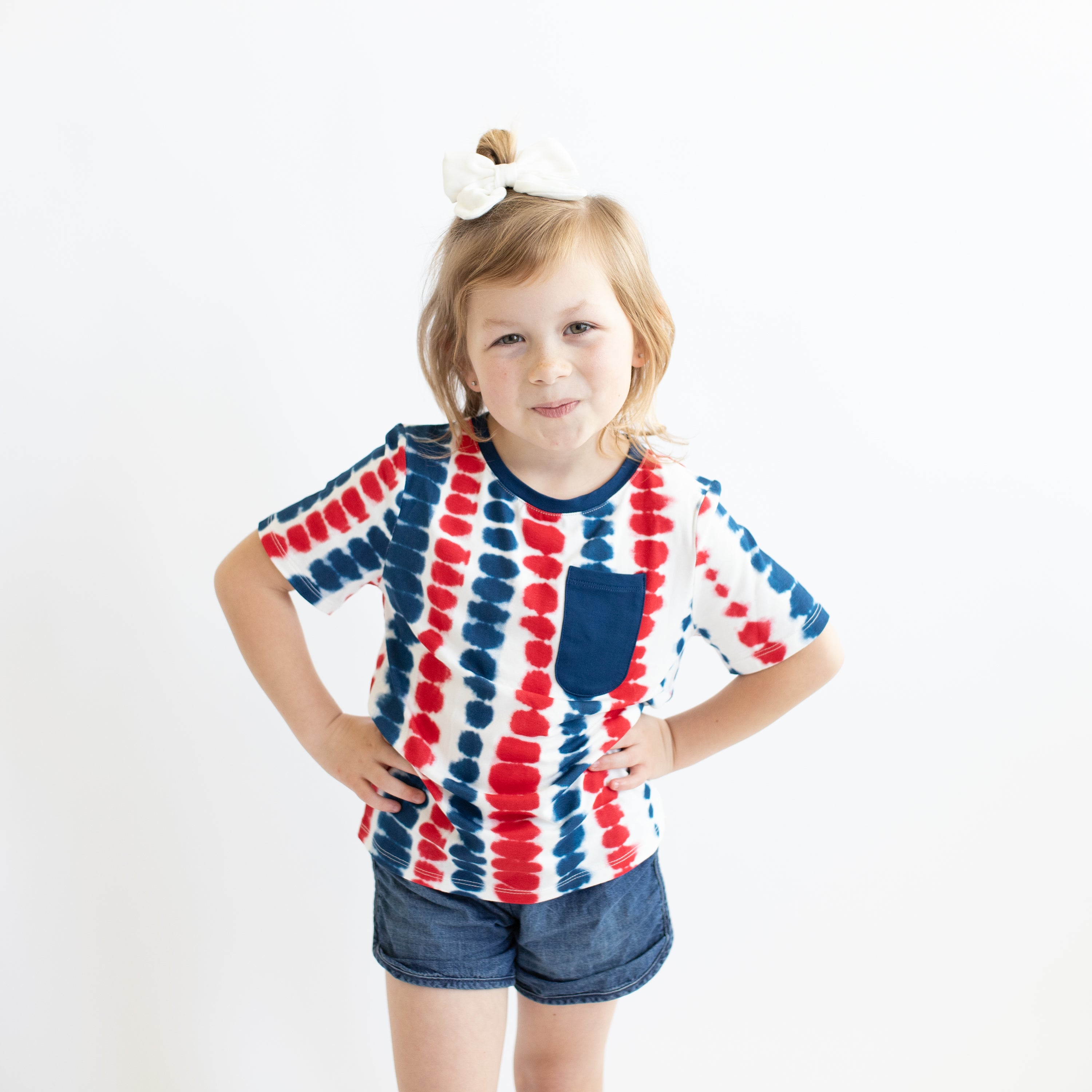 Child modeling Toddler Crew Neck Tee in Liberty Rip Tide and jean shorts