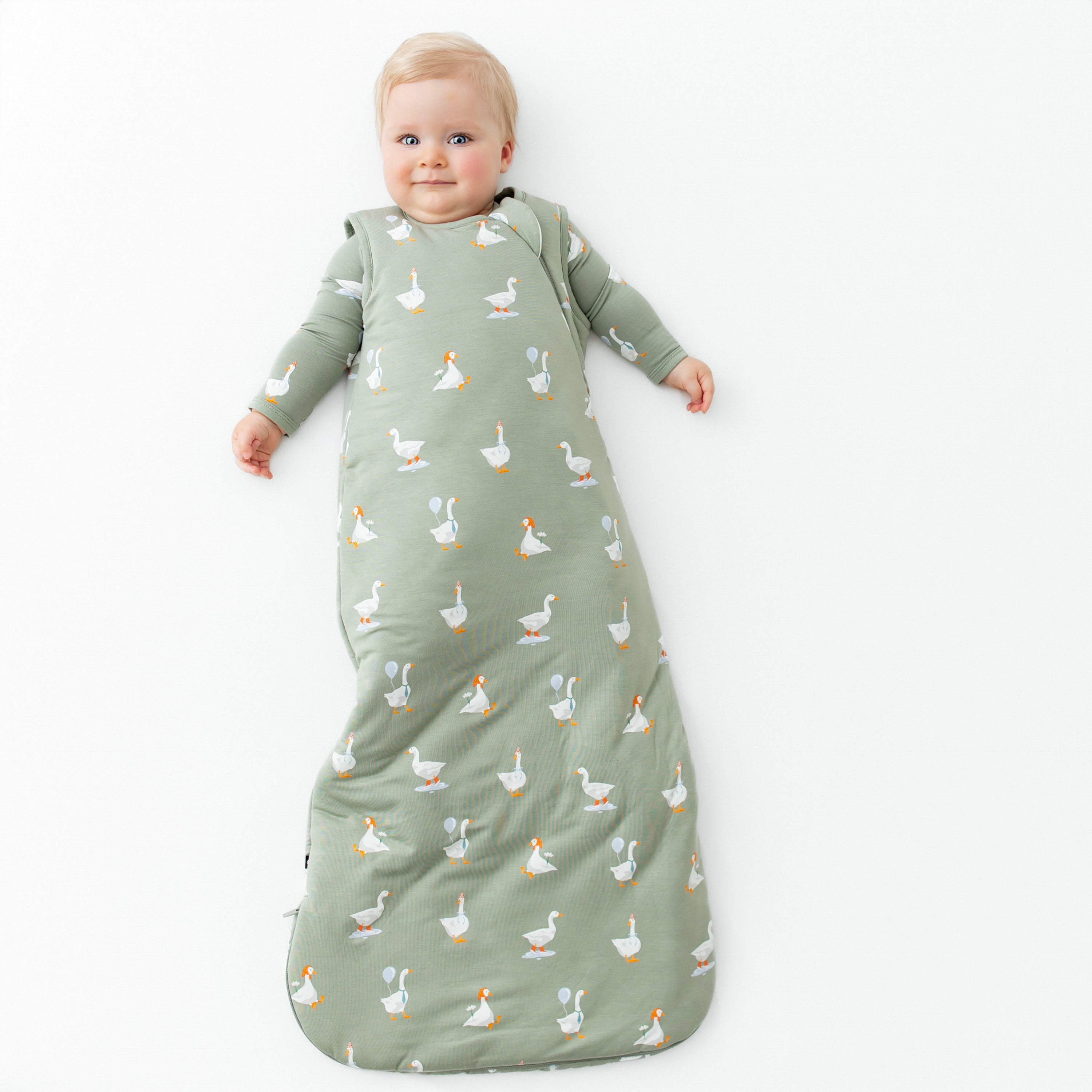 Infant wearing Sleep Bag in Silly Goose 2.5 with long sleeve pajamas
