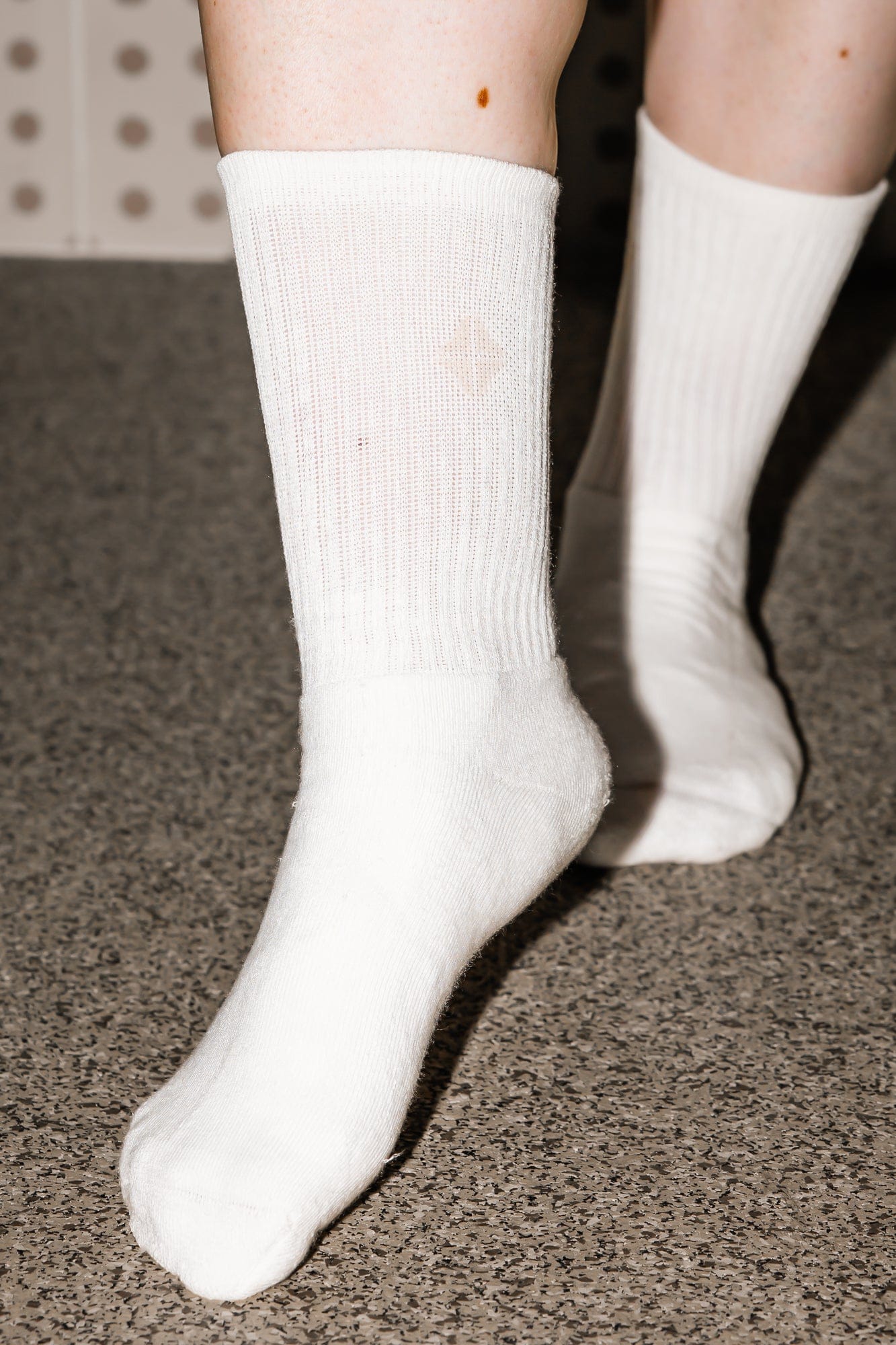 Adult Crew Socks in Cloud shown on a model
