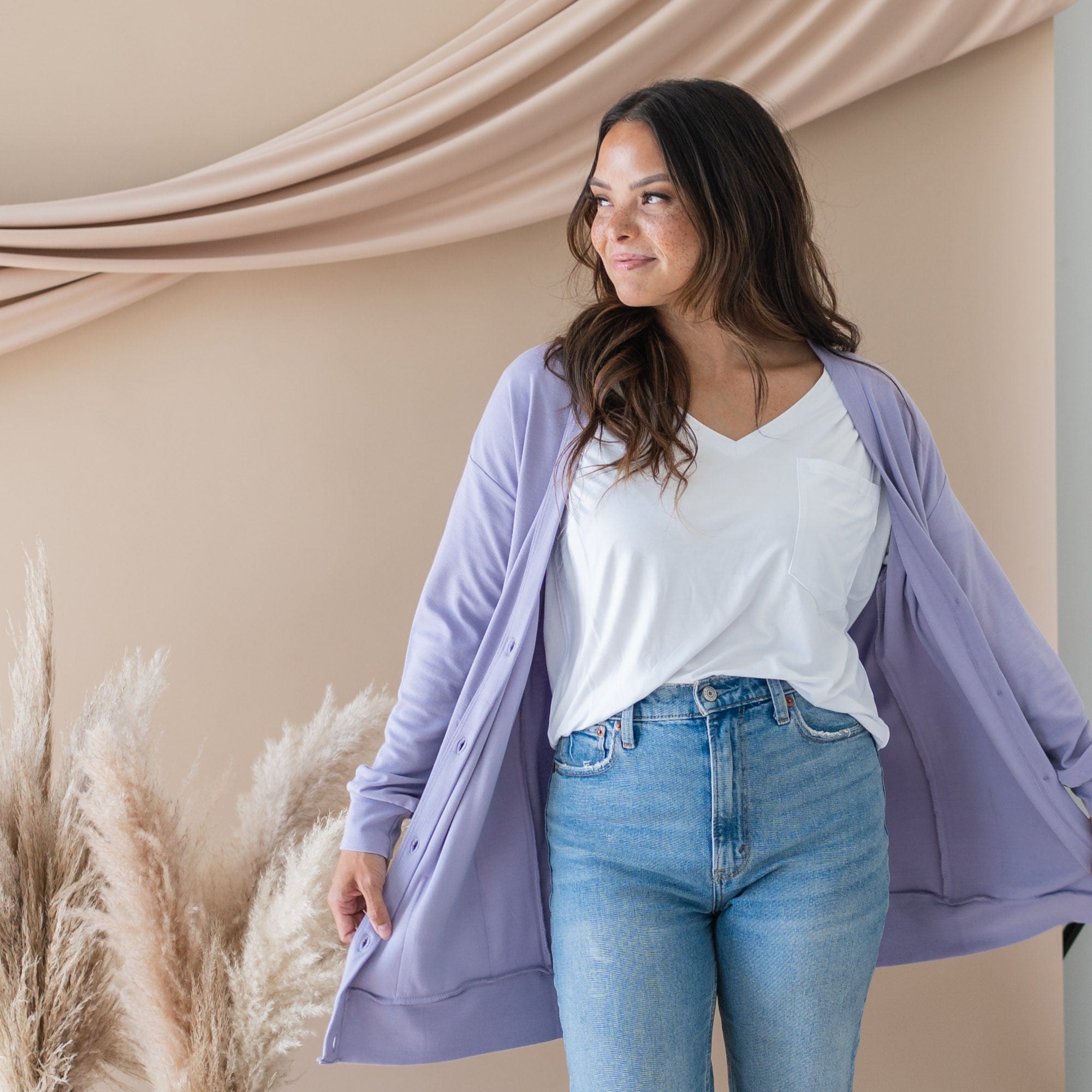 Woman wearing Kyte Baby Bamboo Jersey Long Adult Cardigan in Taro