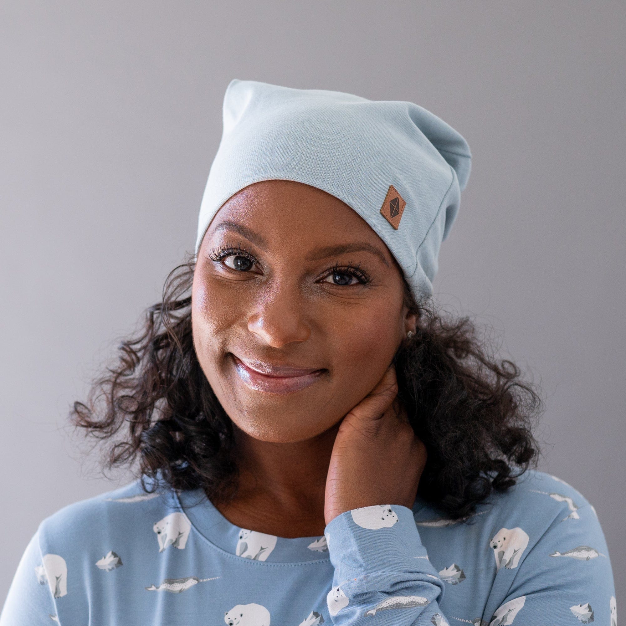 Woman wearing Kyte Baby Adult Beanie in Fog