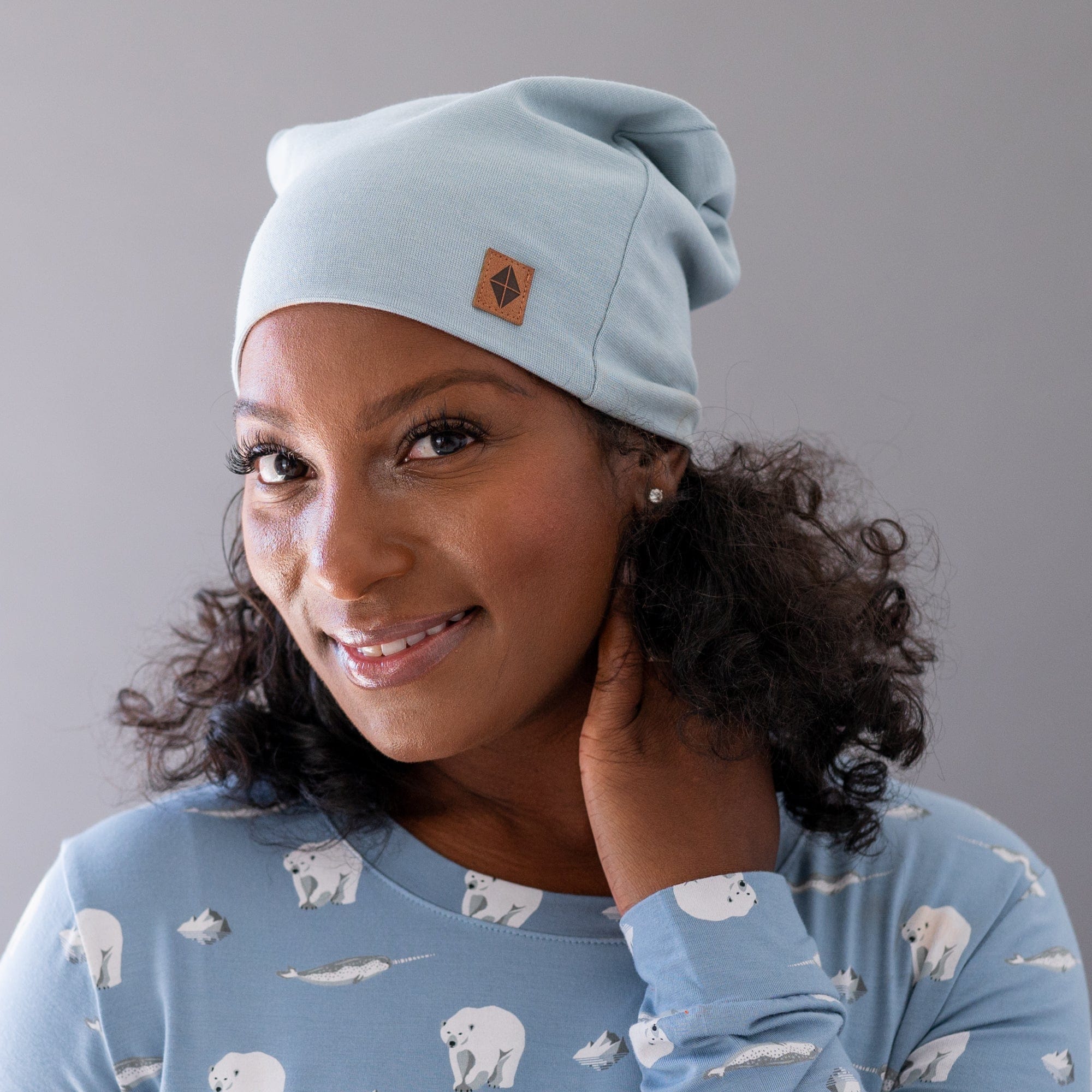 Woman wearing bamboo Adult Beanie hat in Fog