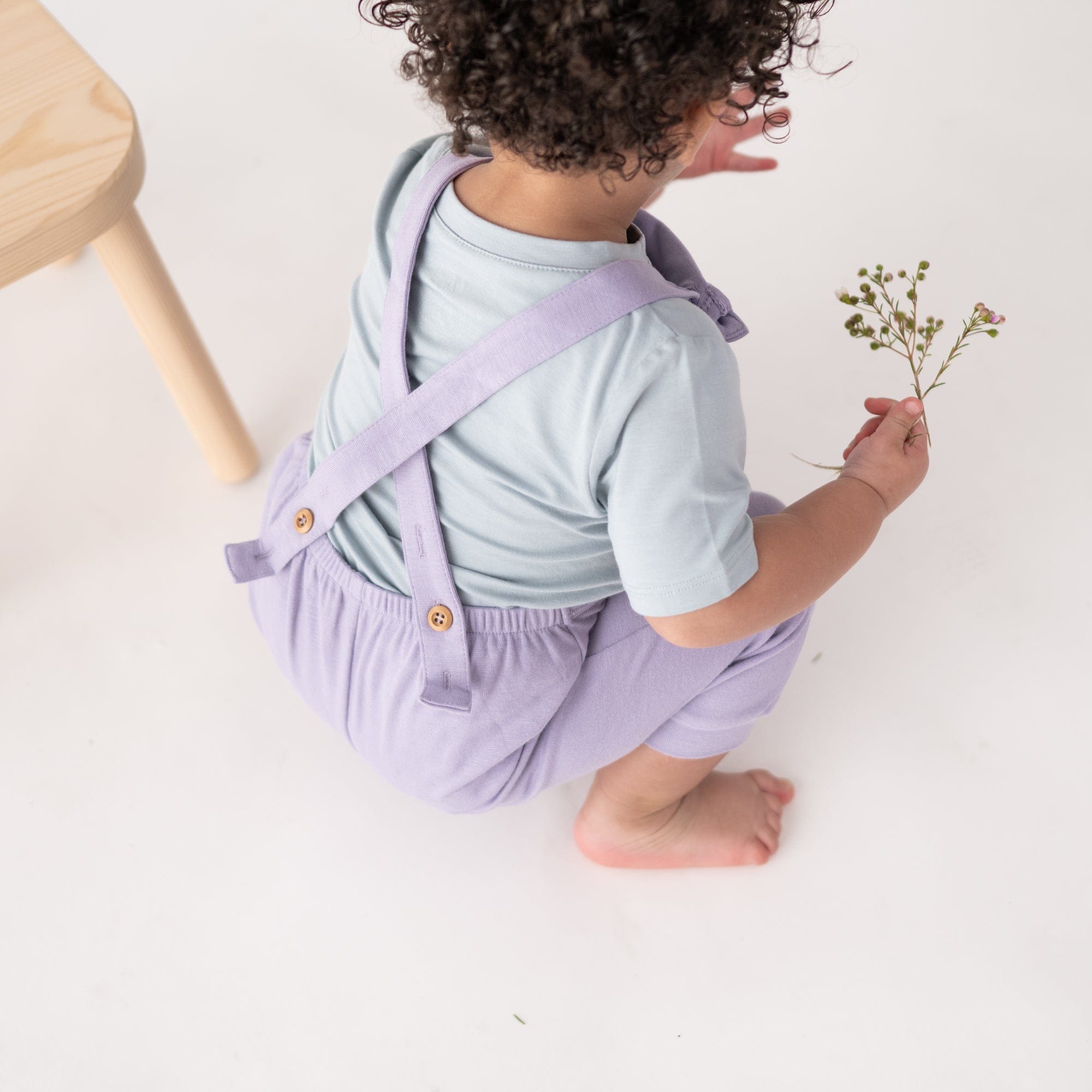 Buttons on Kyte Baby Bamboo Jersey Overall in Taro