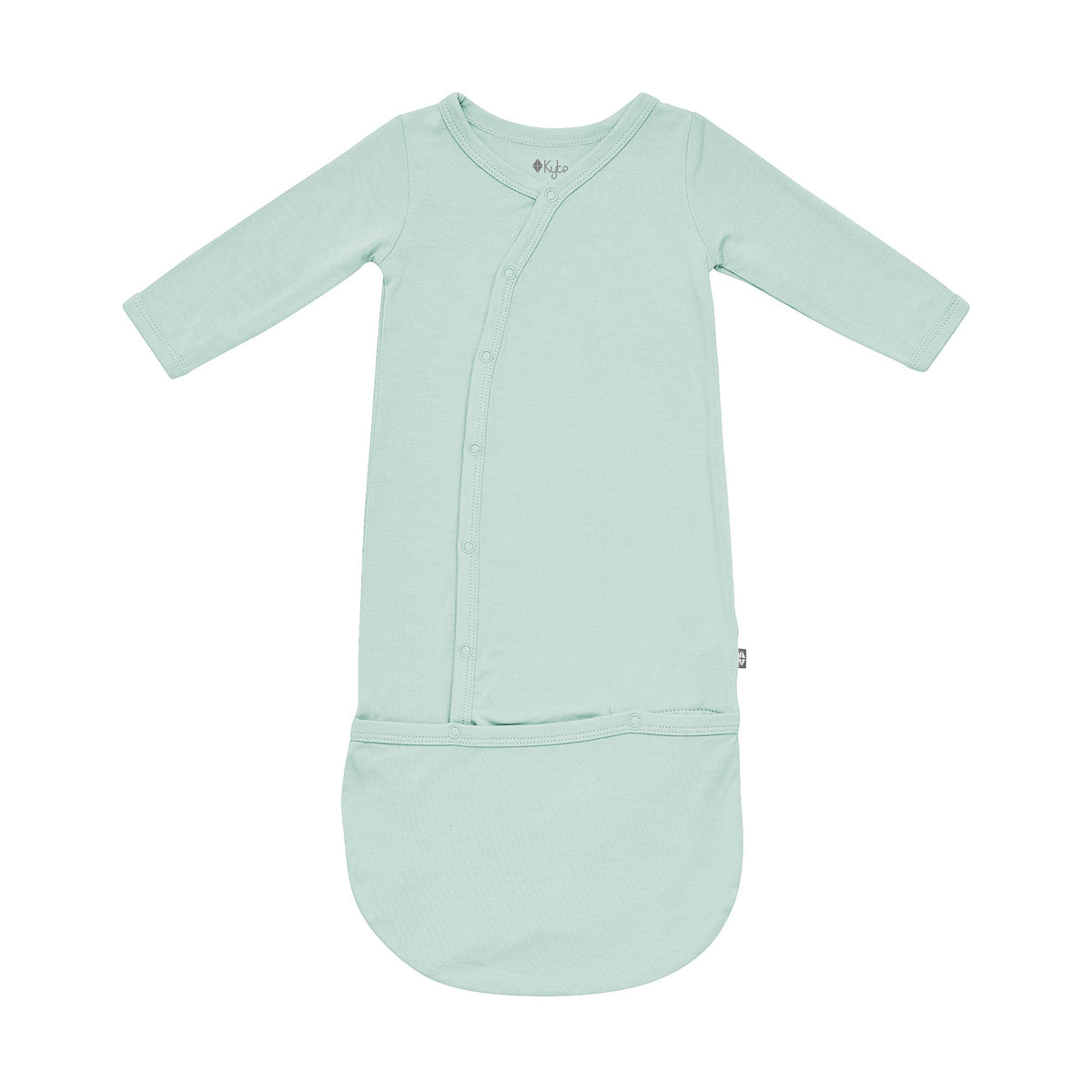 Flat lay of Kyte Baby Bundler in Sage