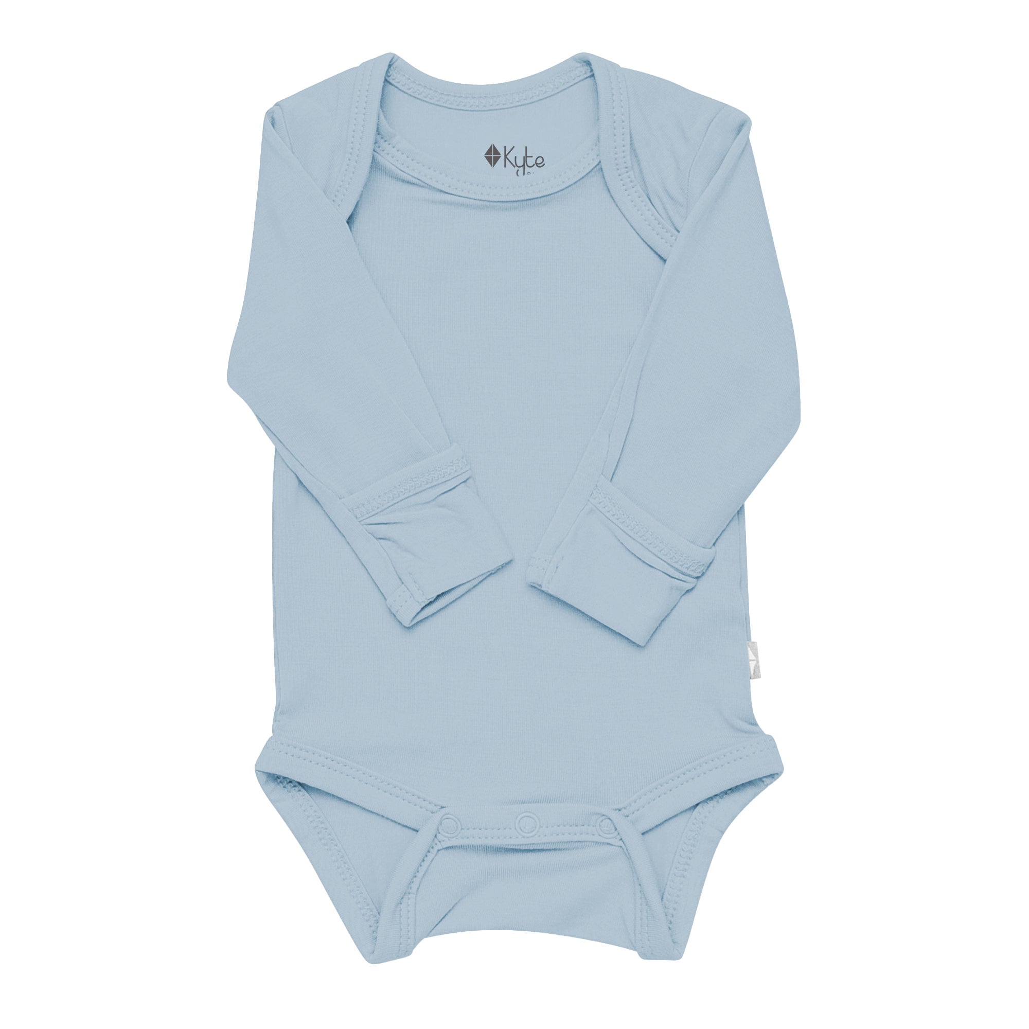 Flat lay of Kyte Baby Long Sleeve Bodysuit in Fog with fold over cuffs