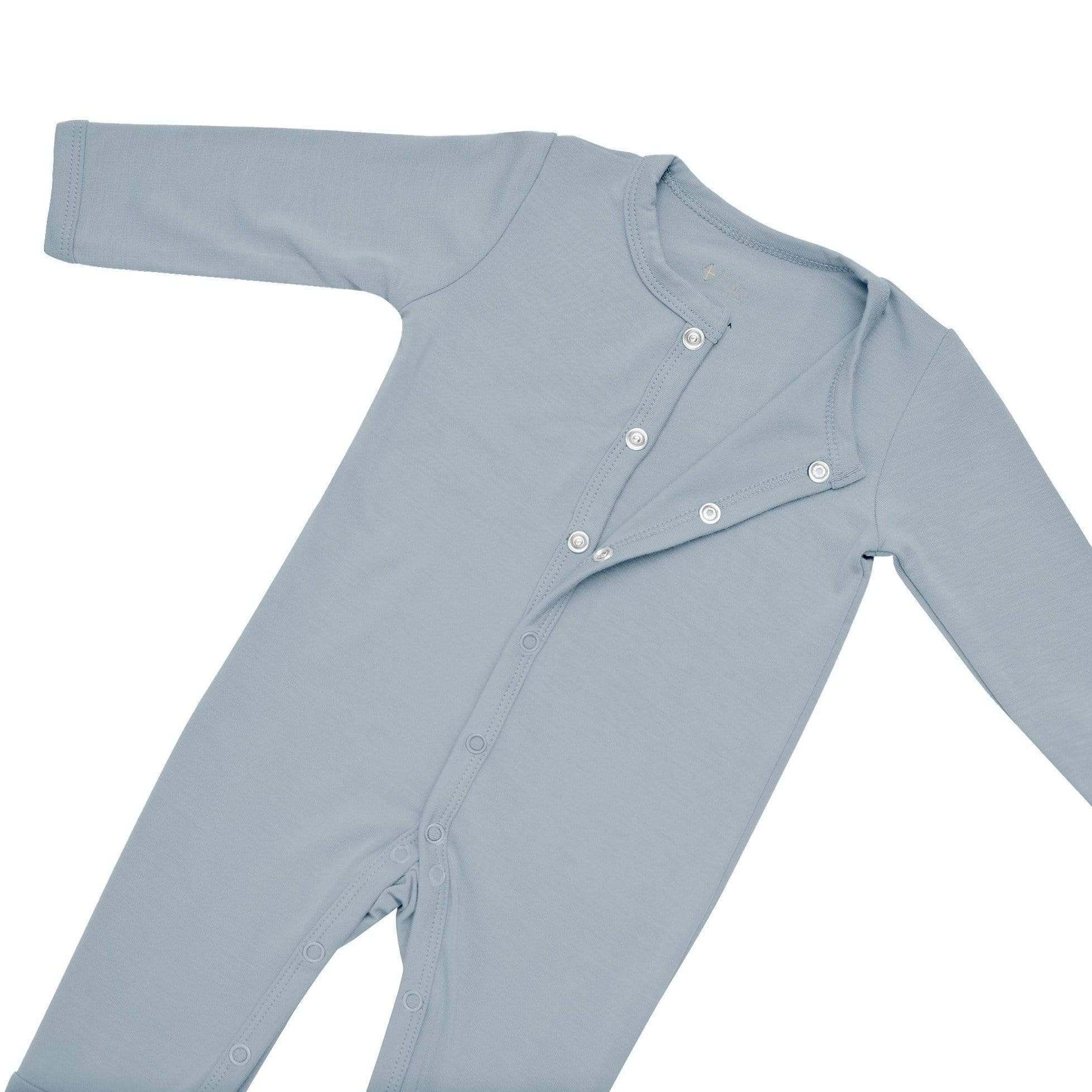 Close up of snaps on the top portion of the Kyte Baby Romper in Fog