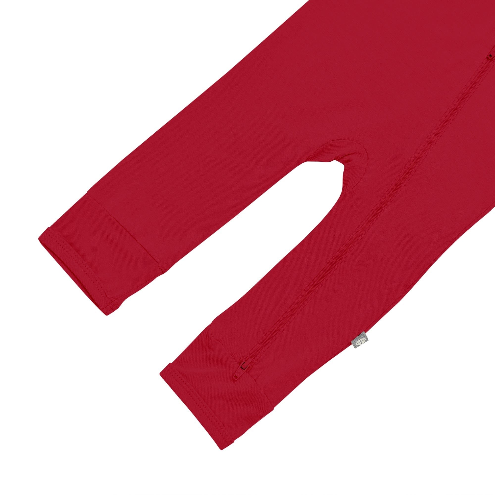 Open feet on Kyte Baby Zippered Romper in Cardinal