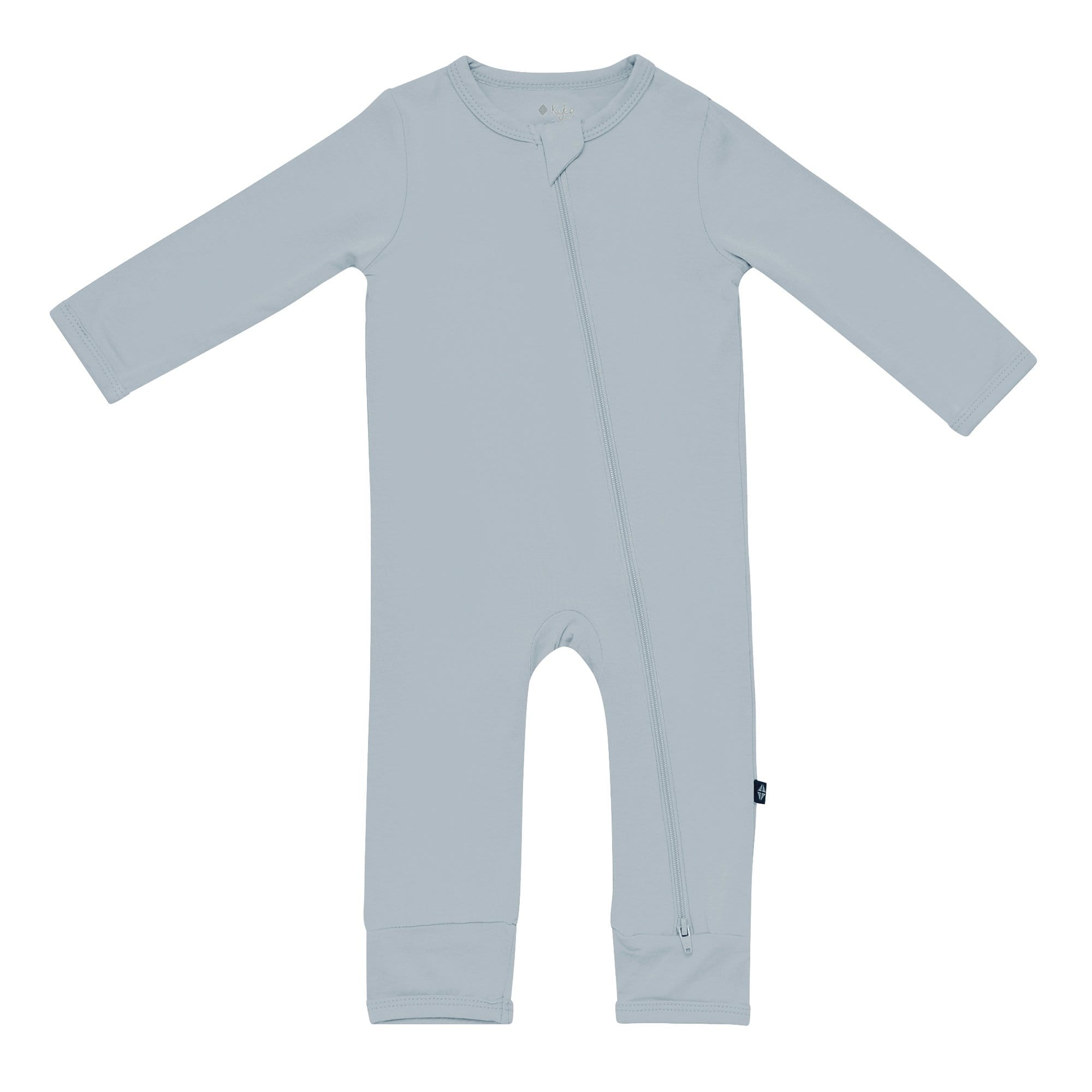 Flat lay of Kyte Baby Zippered Romper in Fog
