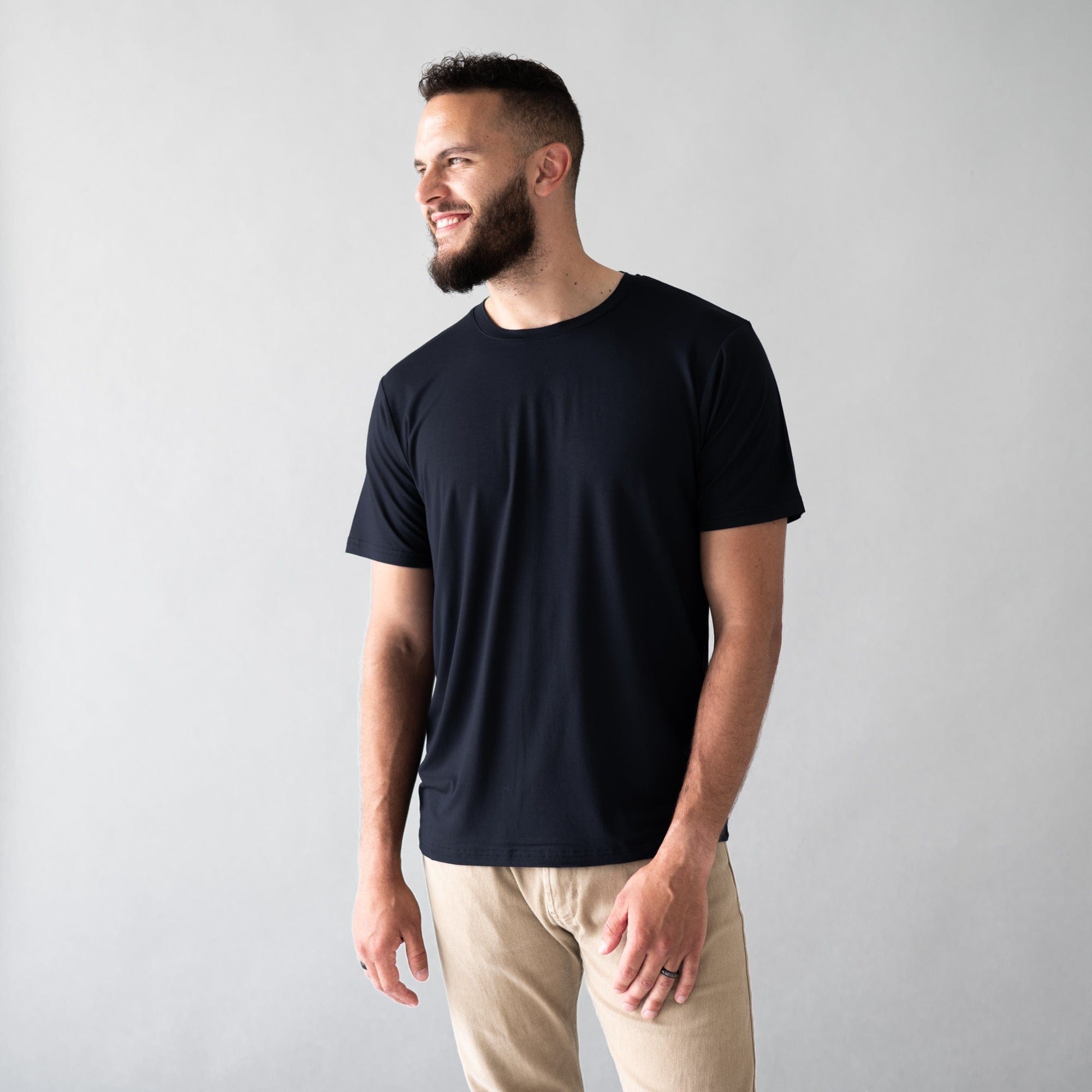 Man wearing Kyte Baby Relaxed Fit Crew Neck Tshirt in Midnight