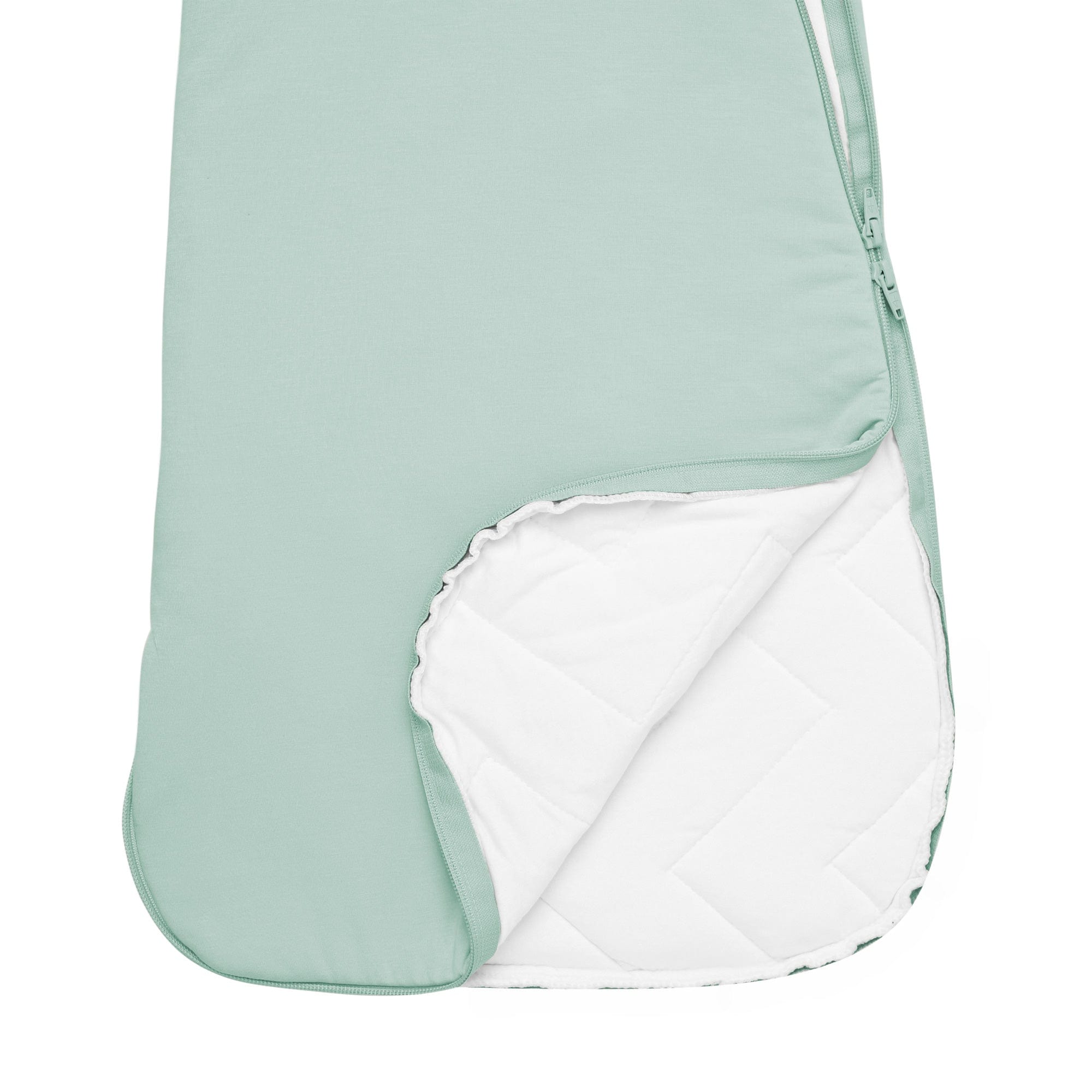 Close up of unzipped dual zipper on bottom of Kyte Baby Sleep Bag in Sage 2.5