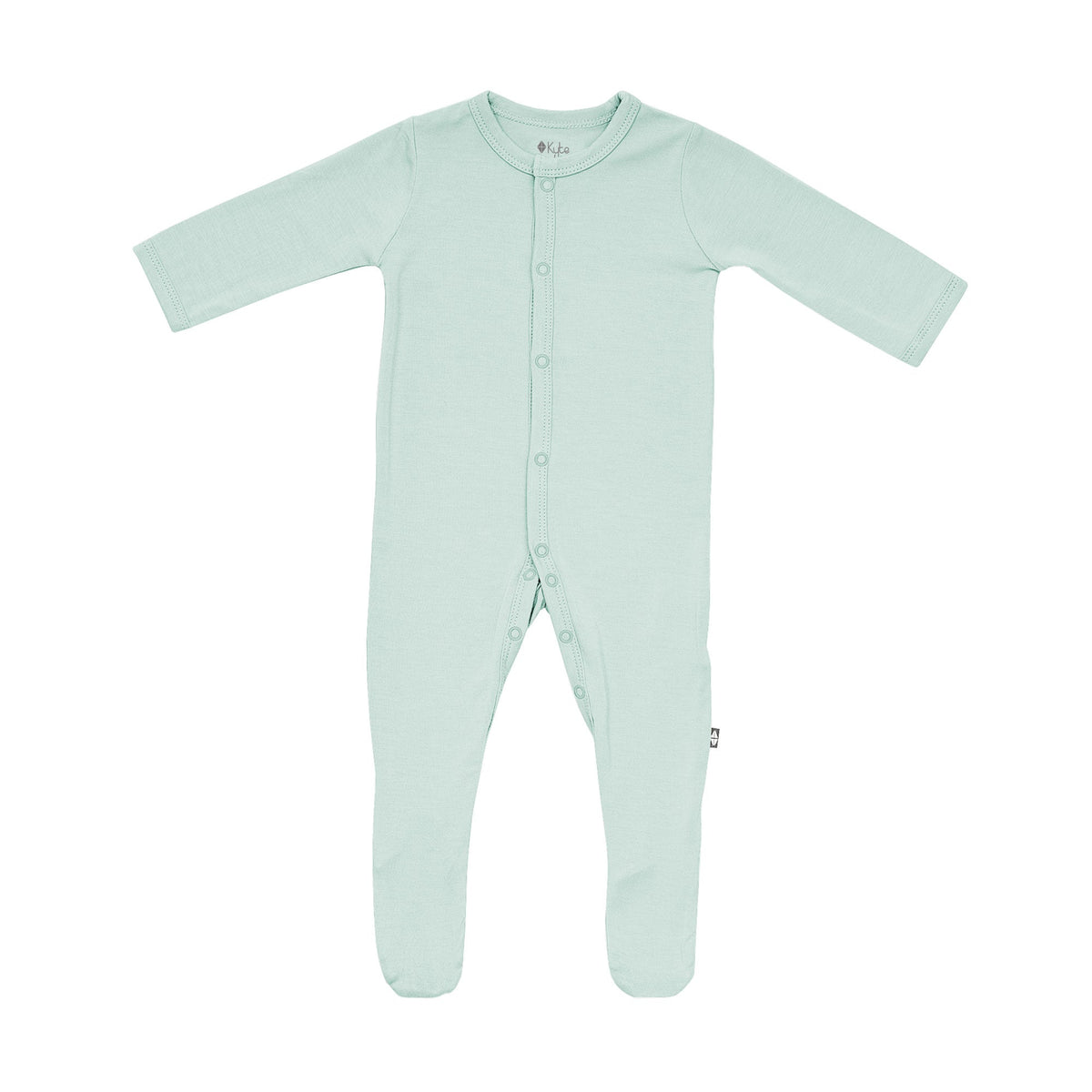 Flat lay of Kyte Baby footie in Sage