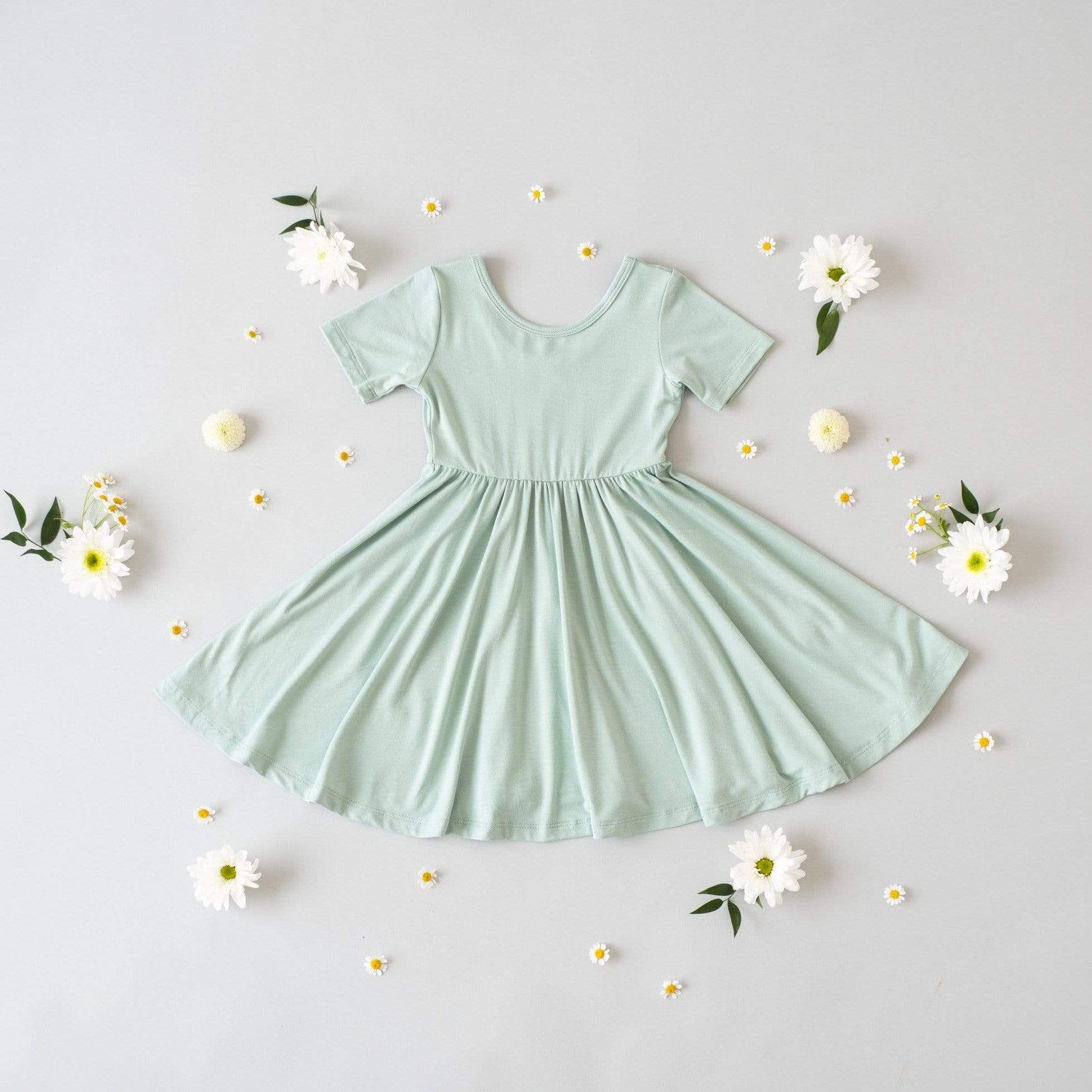 Kyte Baby Short Sleeve Twirl Dress with ballerina neckline in Sage