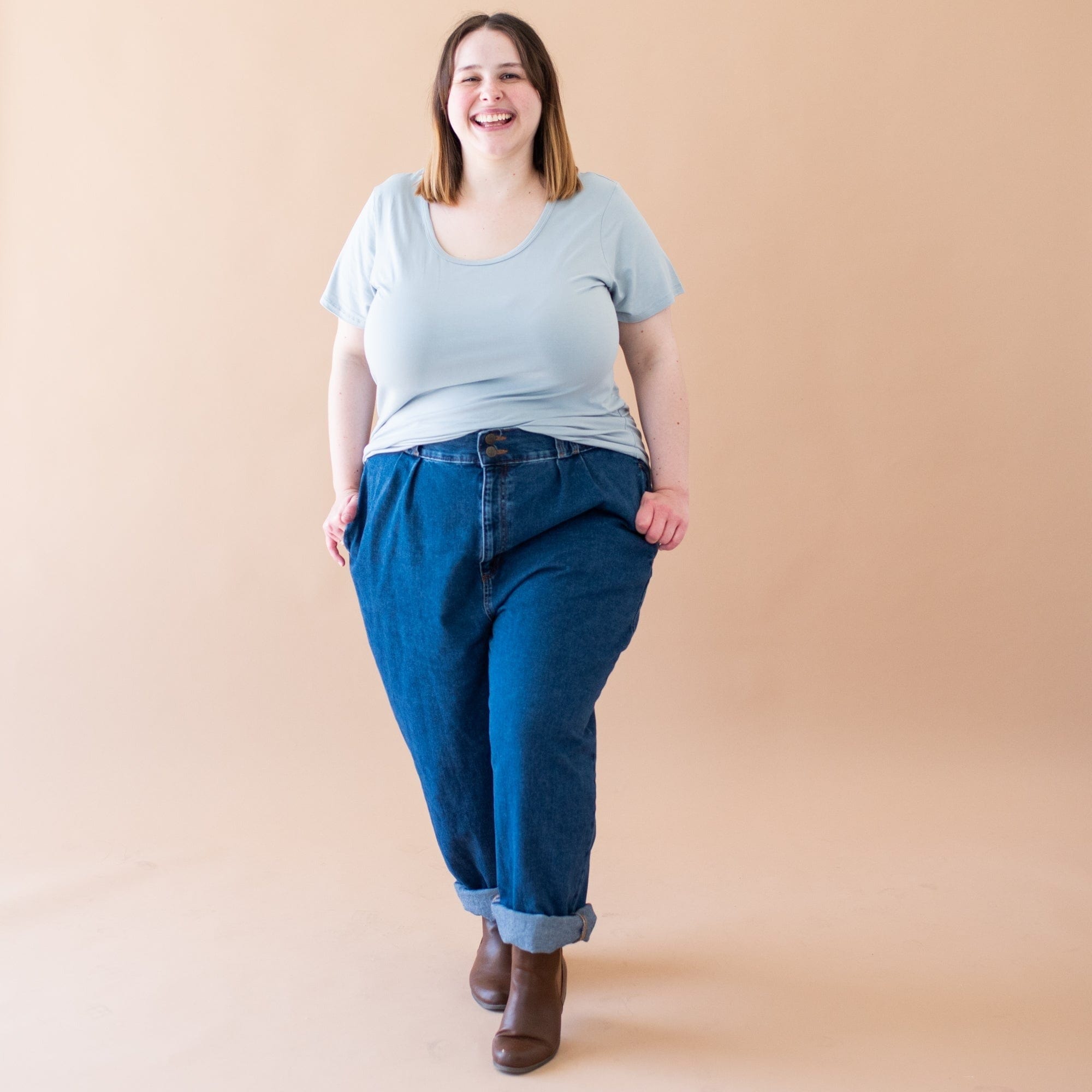 Woman wearing Kyte Baby Women's Scoop Neck bamboo T-shirt in Fog