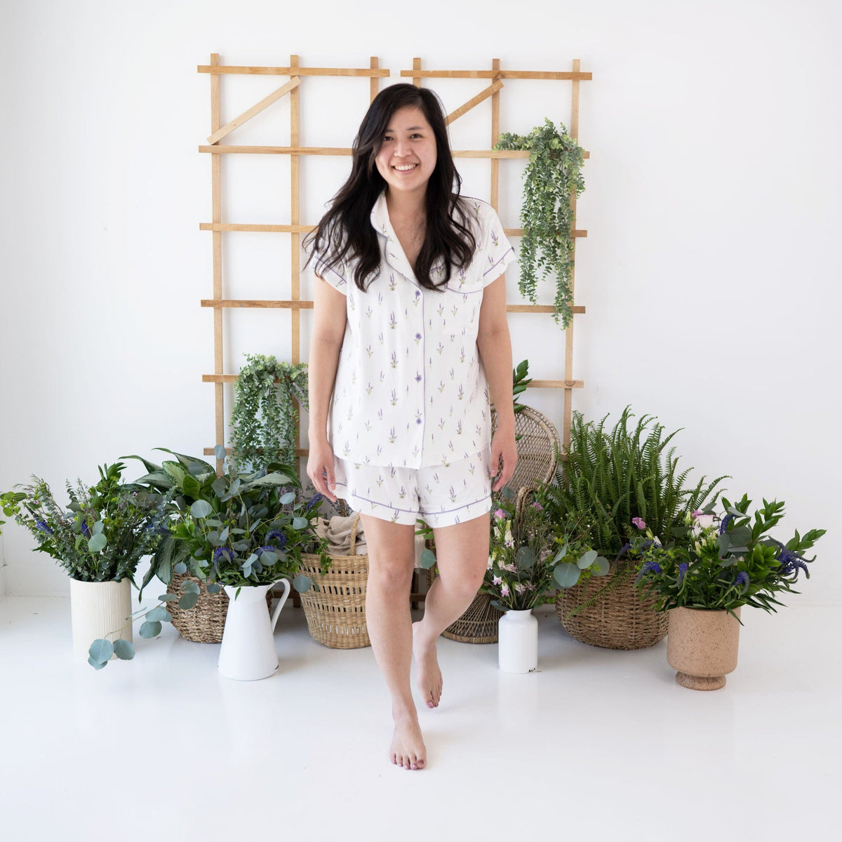 Woman wearing Kyte Baby bamboo Short Sleeve Pajama Set in Lavender