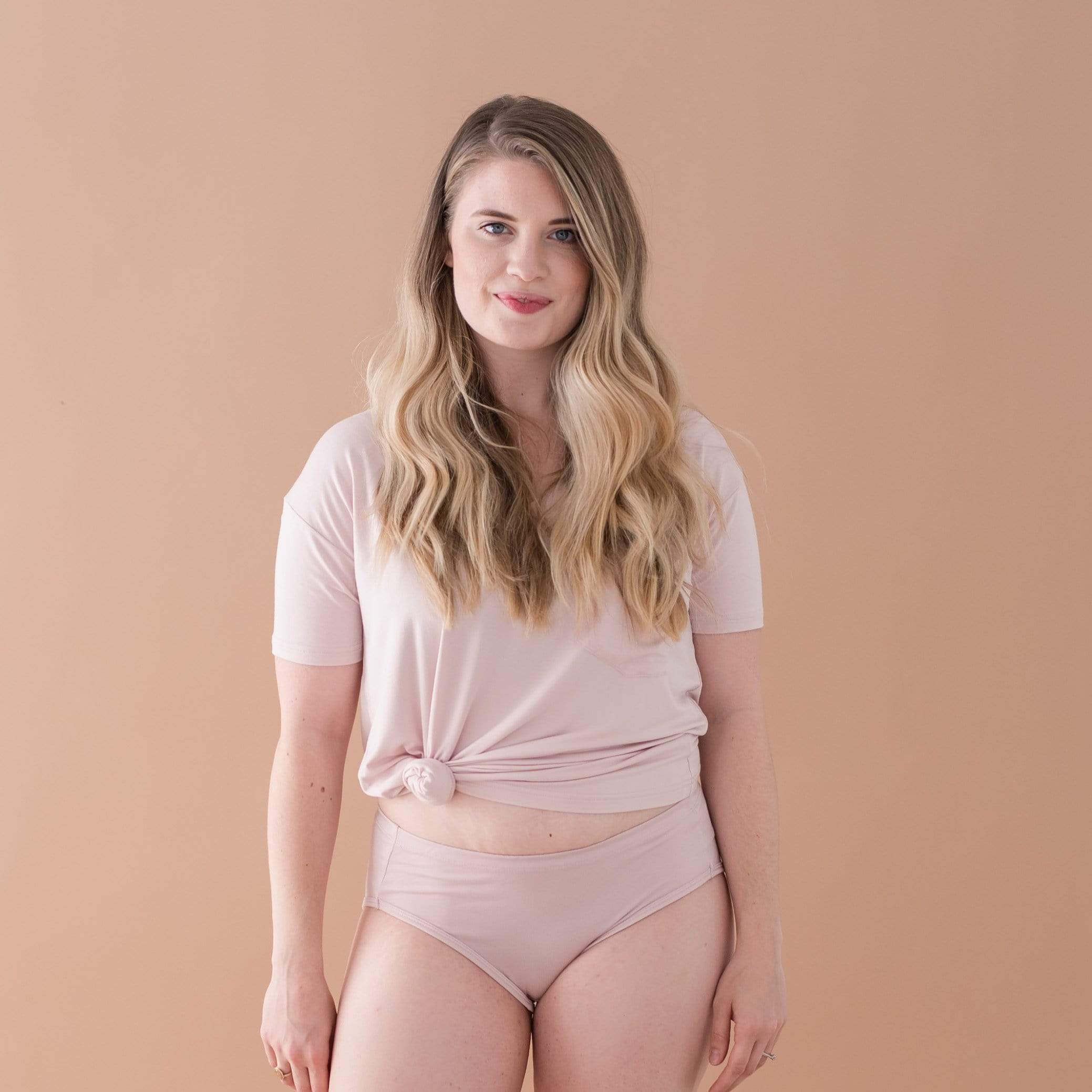 Woman wearing Kyte Baby Women's Underwear and matching tee in Blush