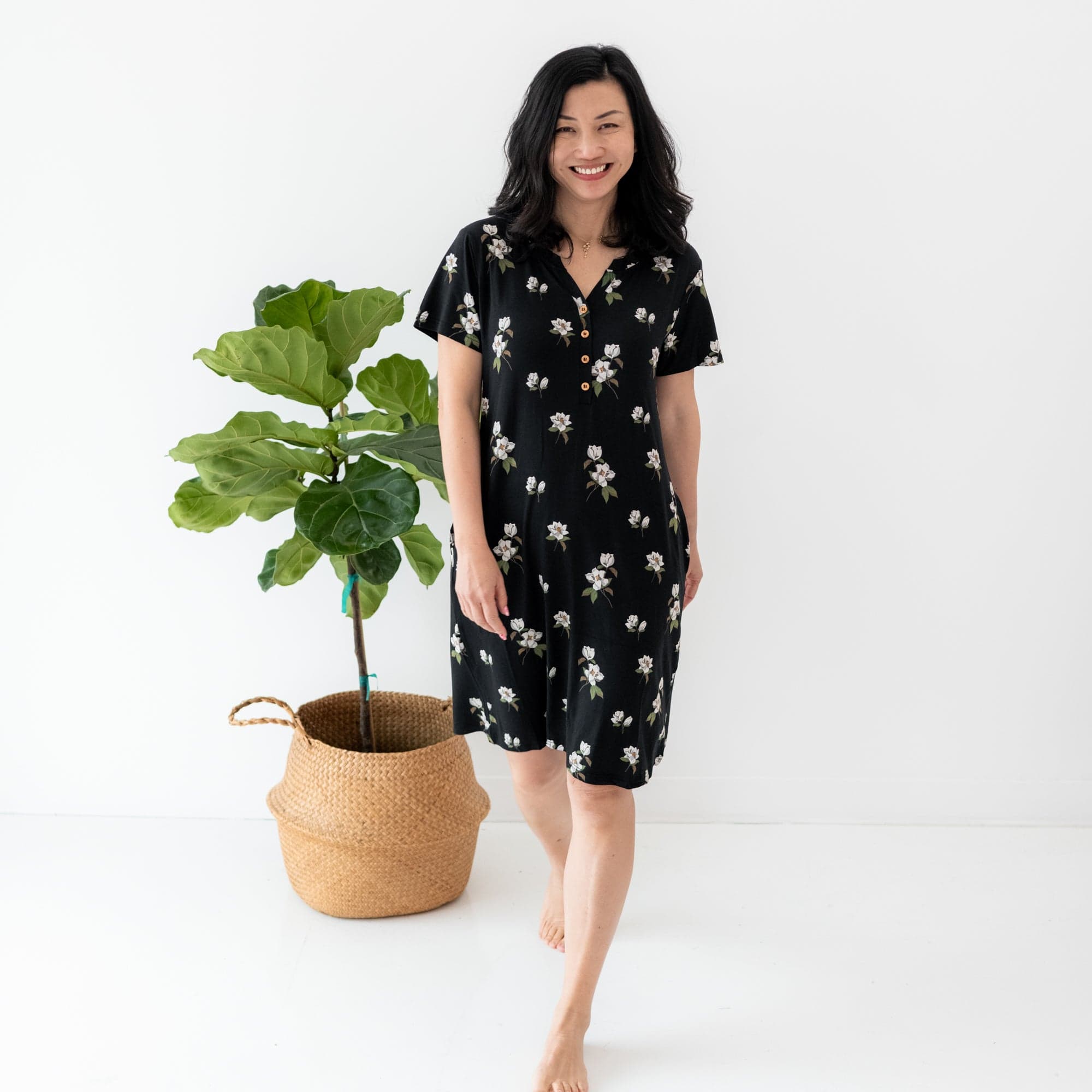 Woman wearing Midi Lounge Dress with pockets in Big Midnight Magnolia