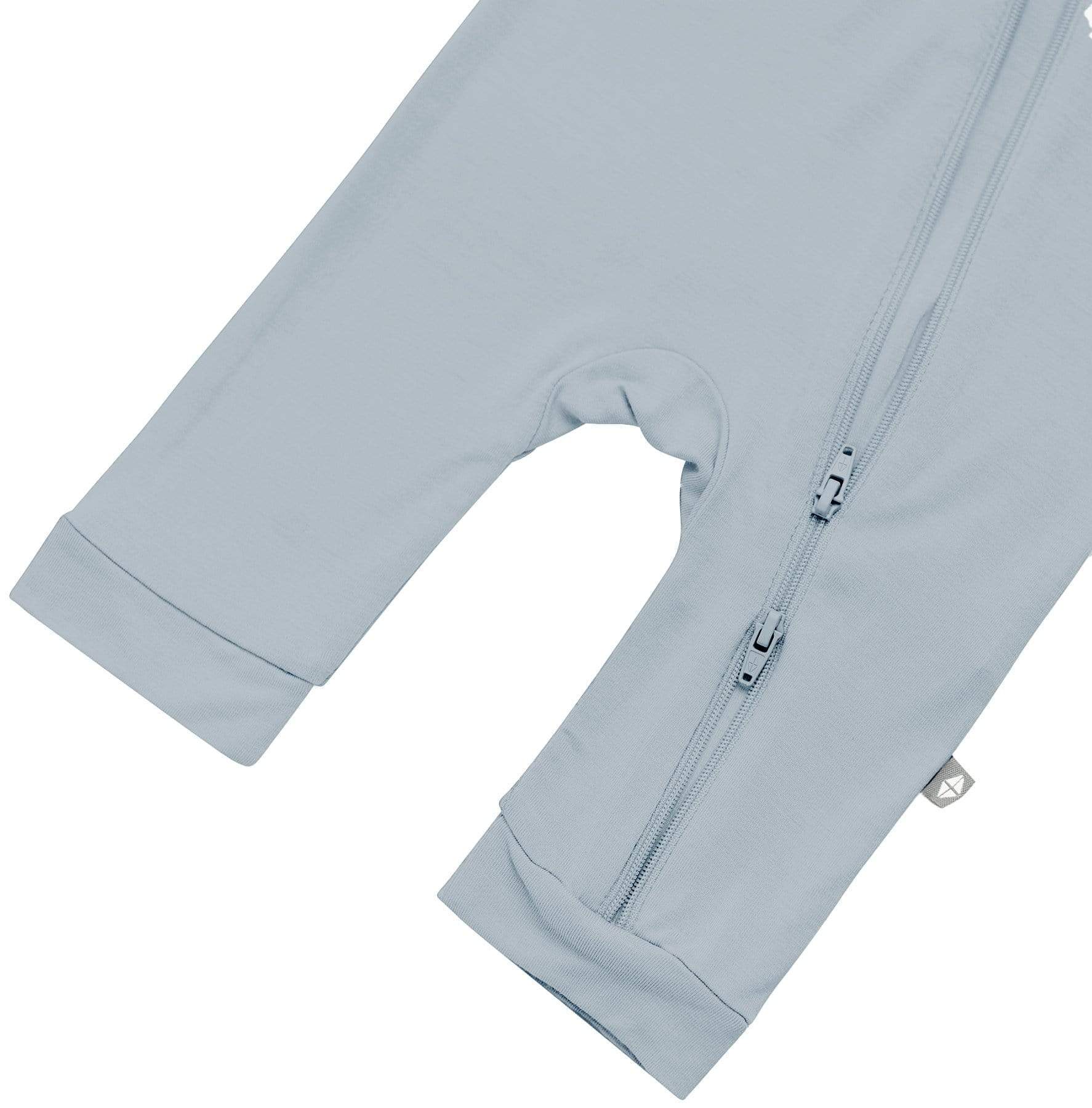 Open feet on Kyte Baby Sleeveless Zippered Romper in Fog