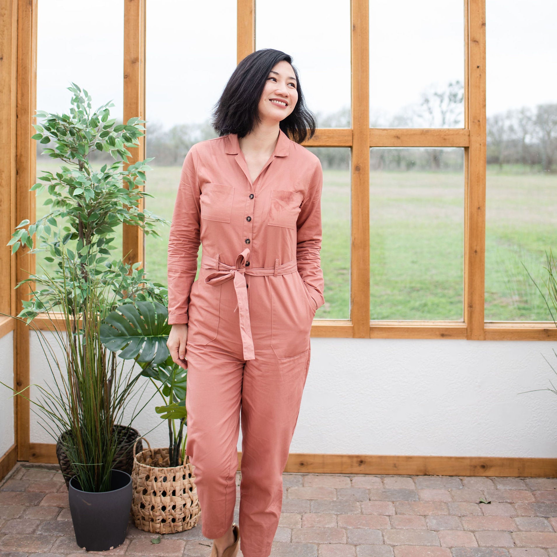 Kyte BABY founder, Ying Liu, wearing a pink jumpsuit