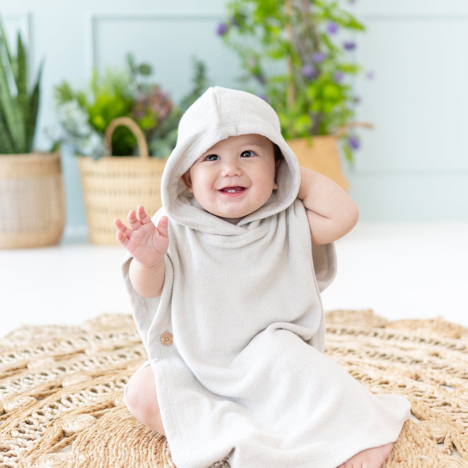 Baby in Kyte Baby Terry Swim Poncho in Oat