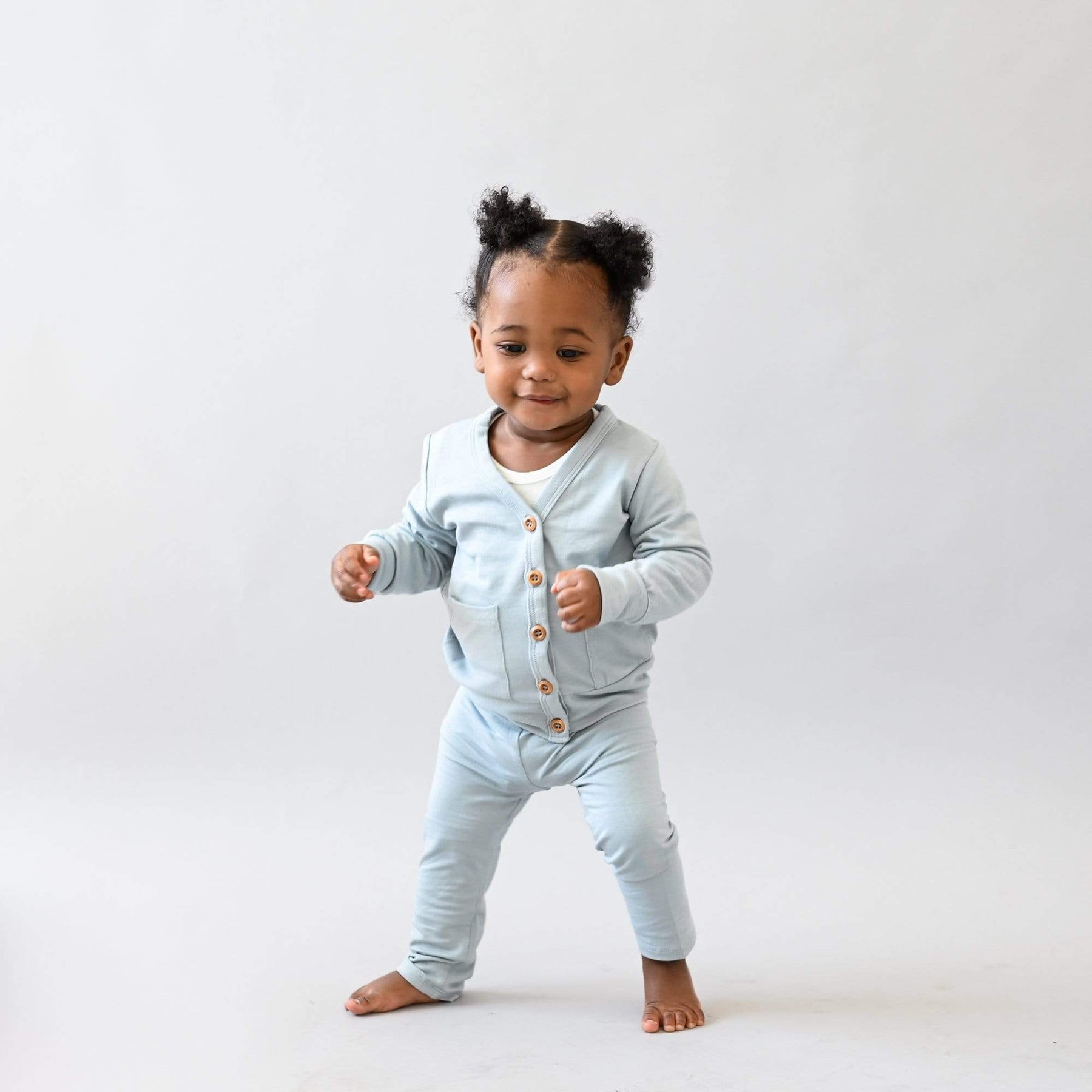 toddler modeling bamboo jersey cardigan in fog