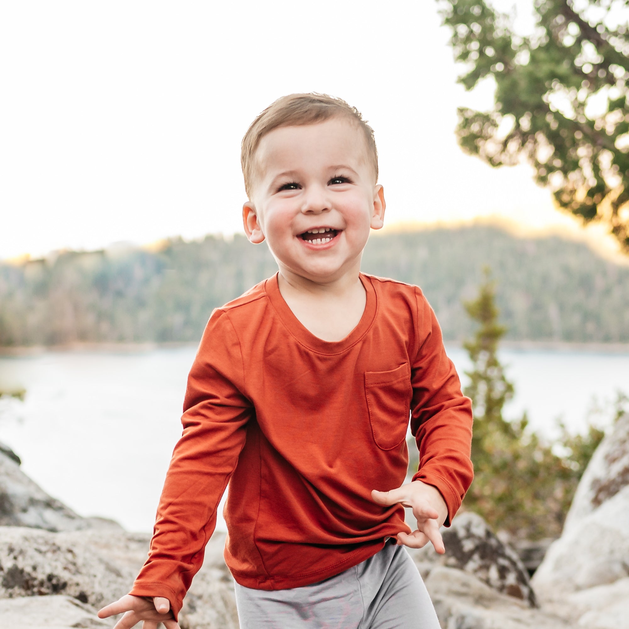 toddler modeling rust unisex tee