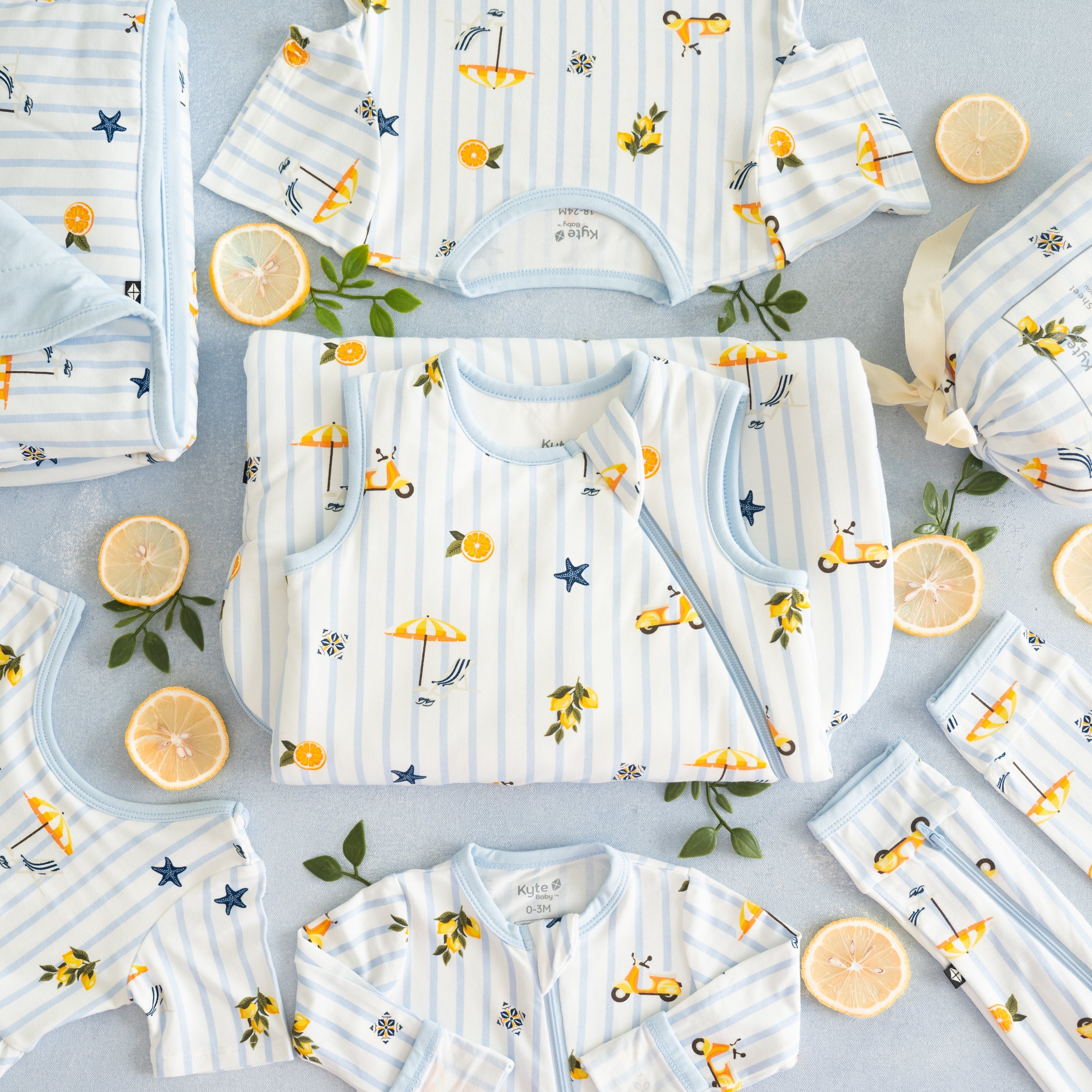 Stripe pajamas, striped baby pajamas, lemon baby clothes, blankets, sleep bags, and nursery bedding