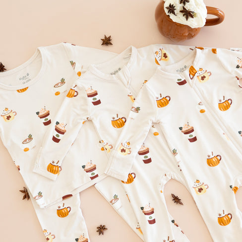 fall pajamas in croissant and pumpkin spice latte from kyte baby