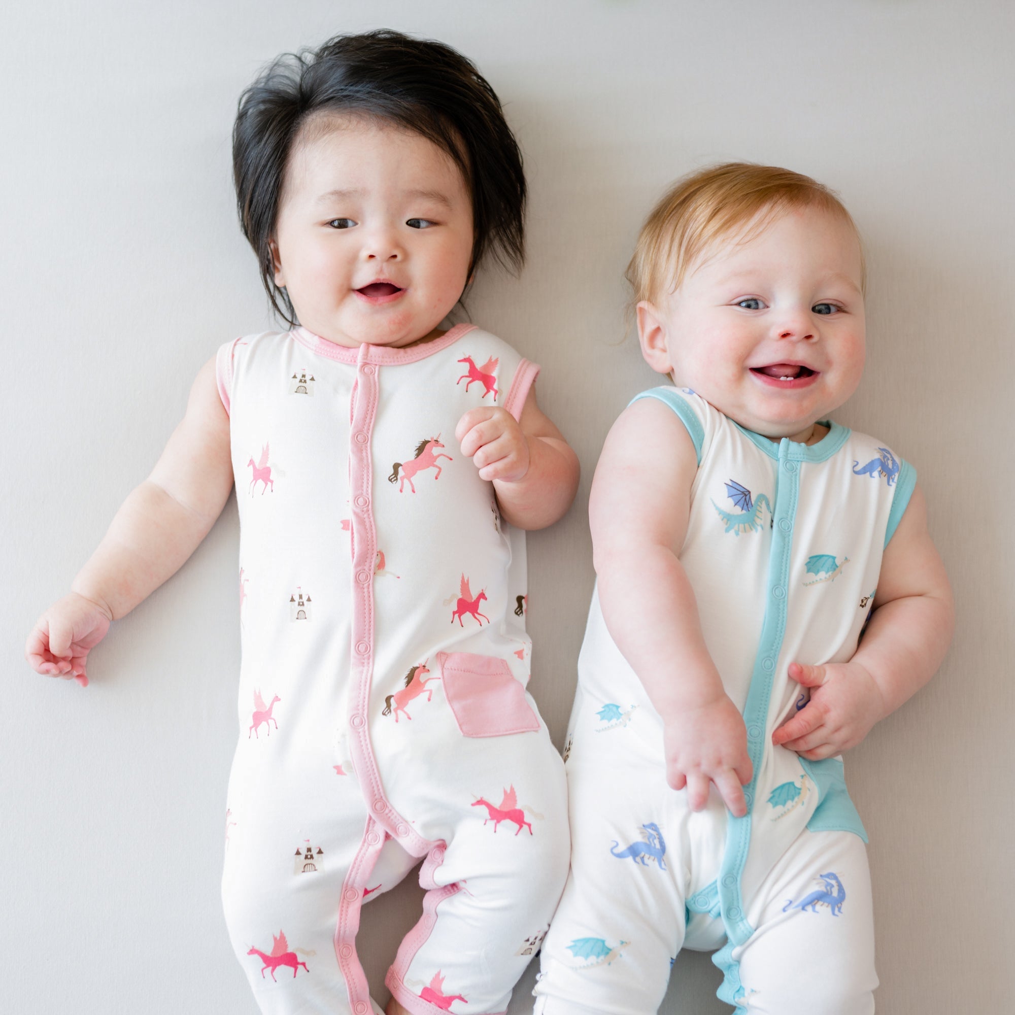 babies wearing snap rompers