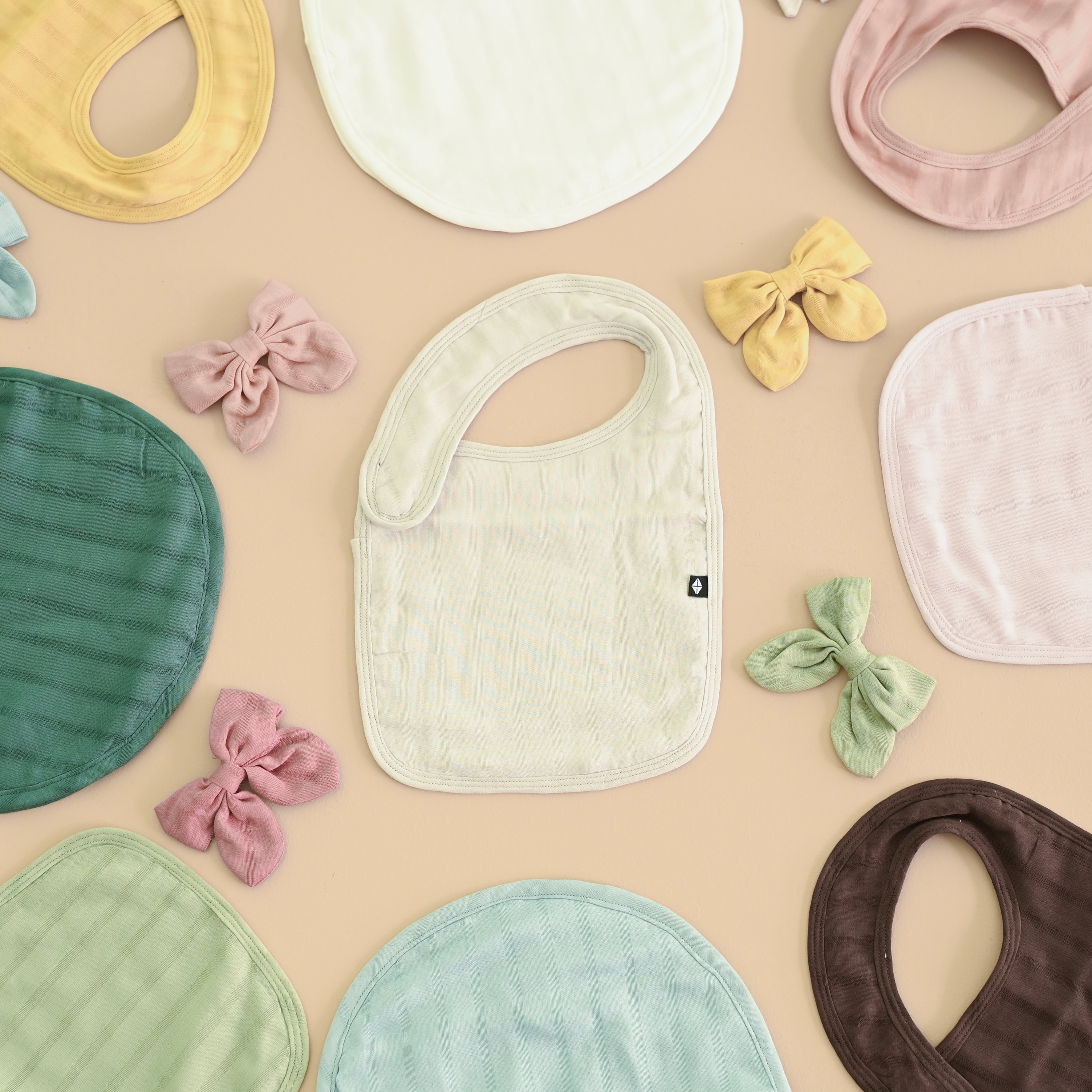 flat lay image showing new bamboo muslin styles from kyte baby