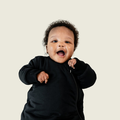 baby in midnight slumber bag