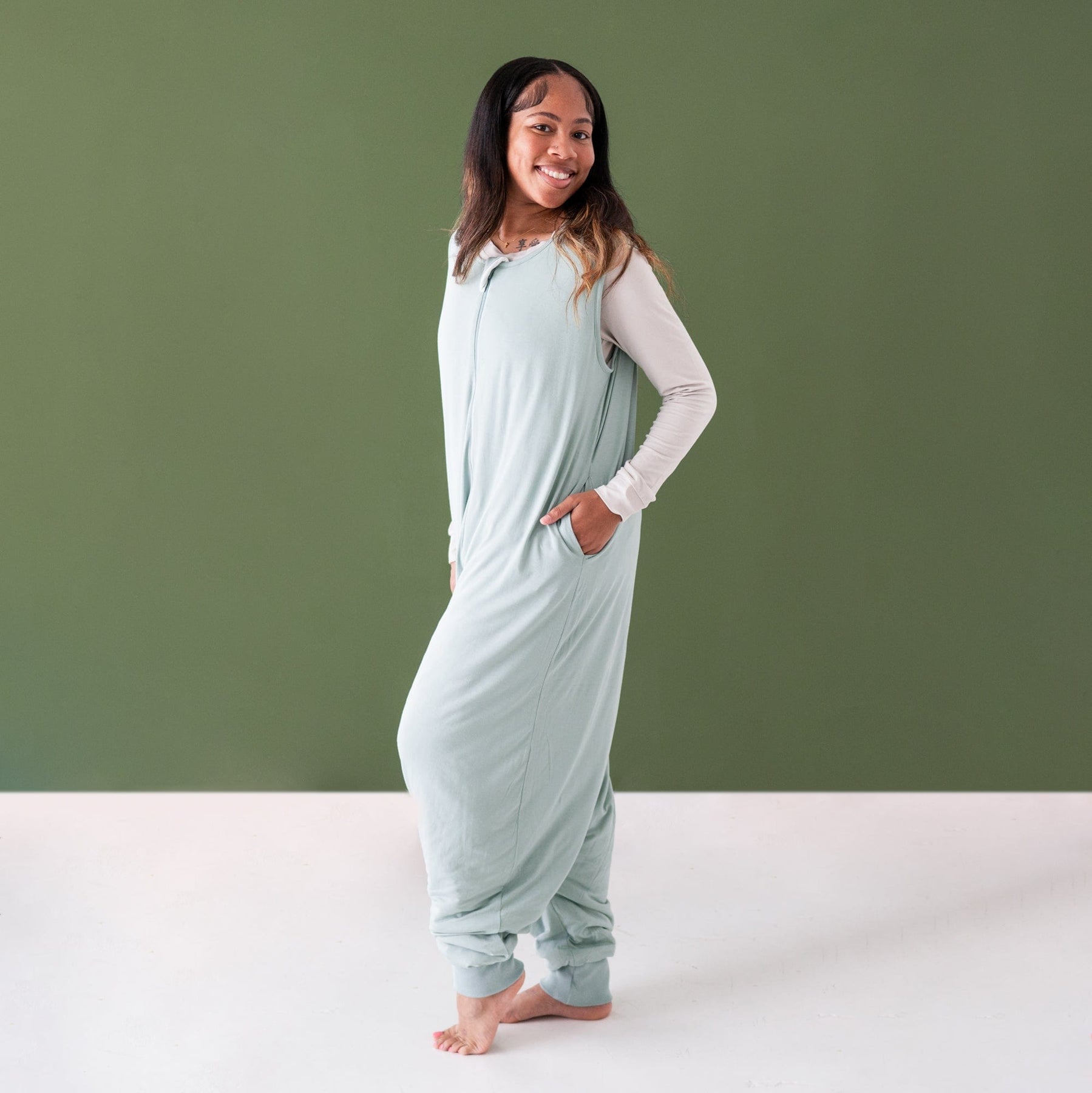 woman modeling sleep bag walker in sage