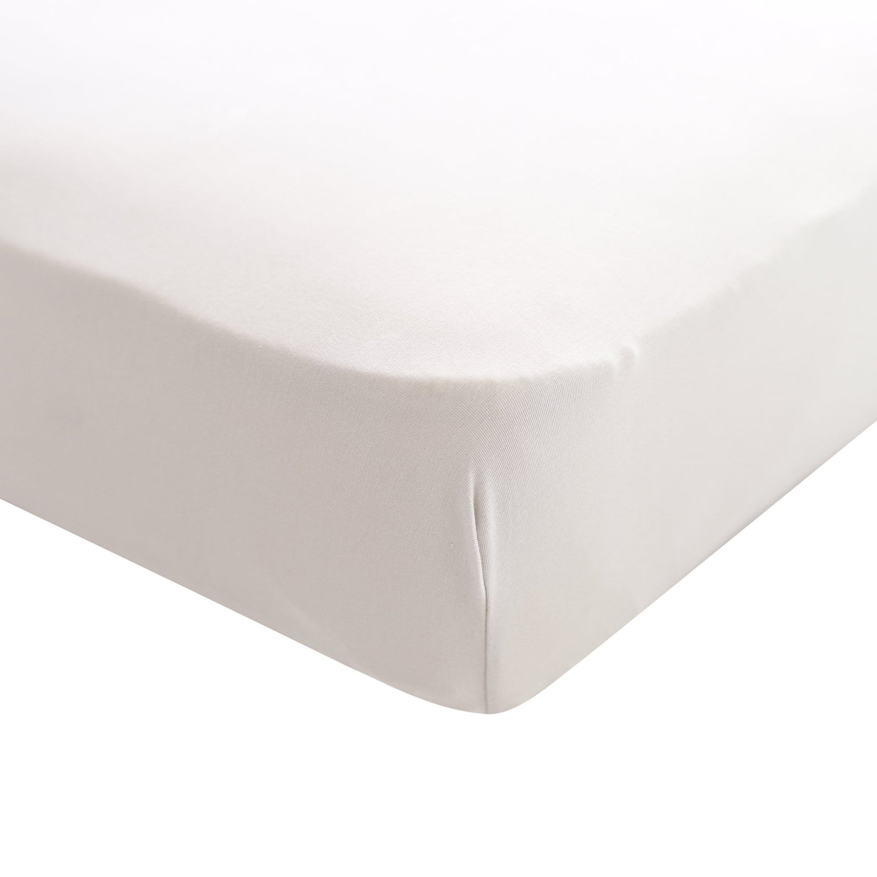 Twin sheet in the color oat shown on a mattress