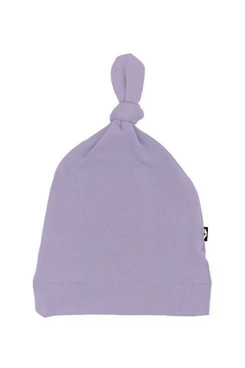 Flat lay of Kyte Baby Knotted Cap in Taro