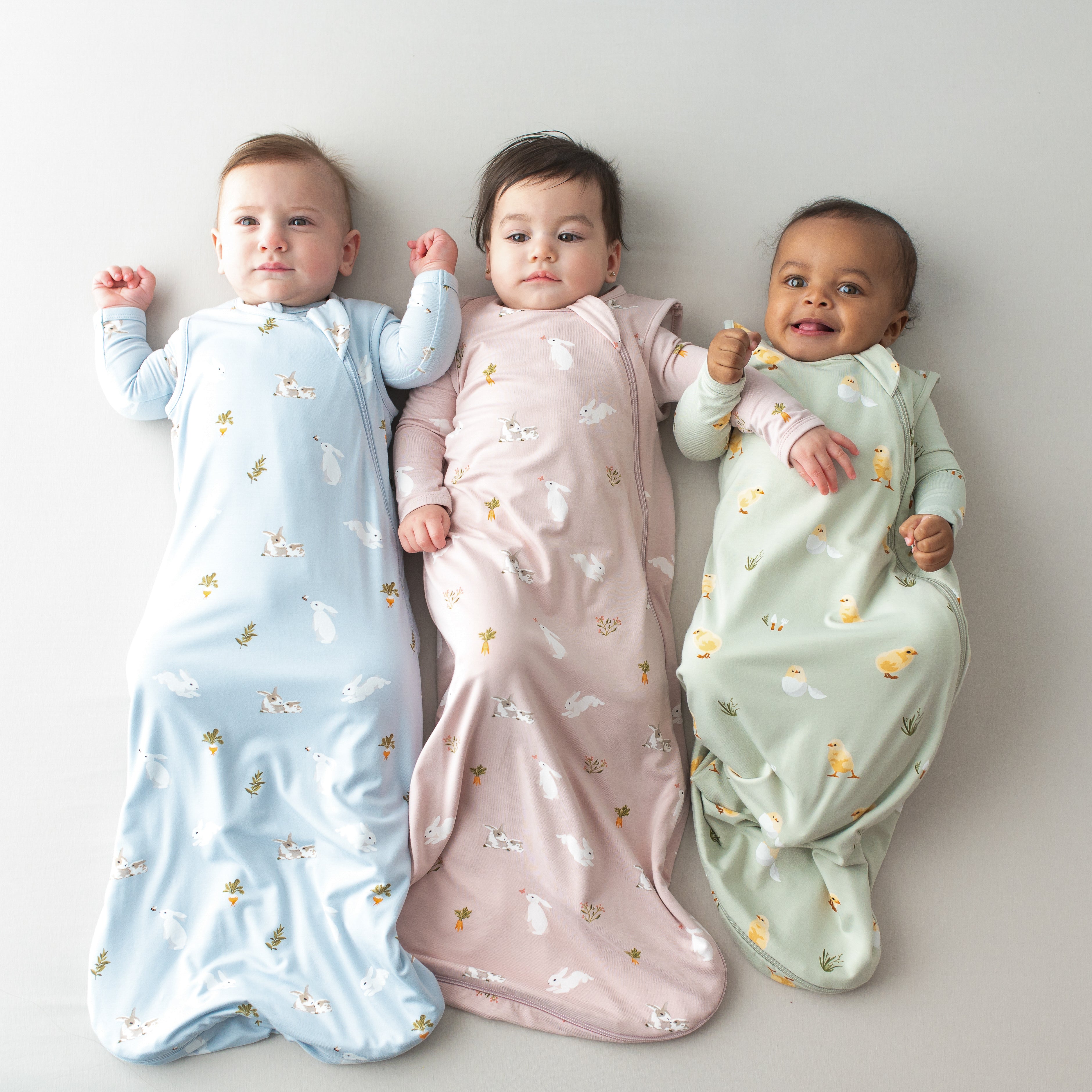 3 babies in 0.5 sleep bags in easter collection 